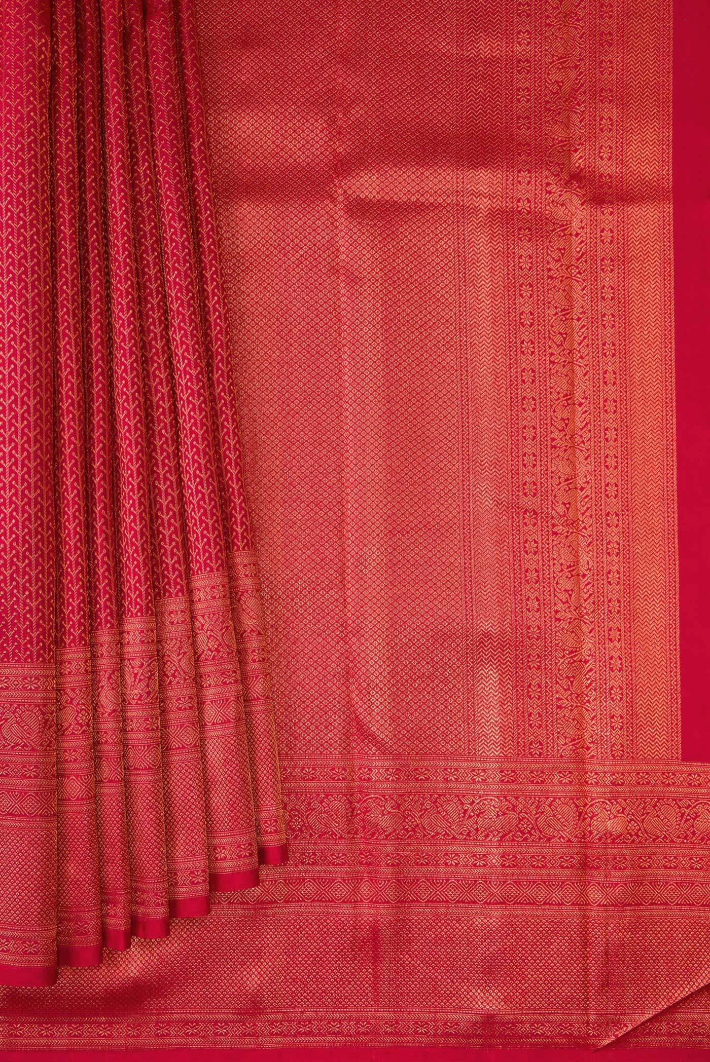 Pleats and pallu of Red Kanjivaram Silk Saree with Zari Brocade on the body and Fancy Border. 