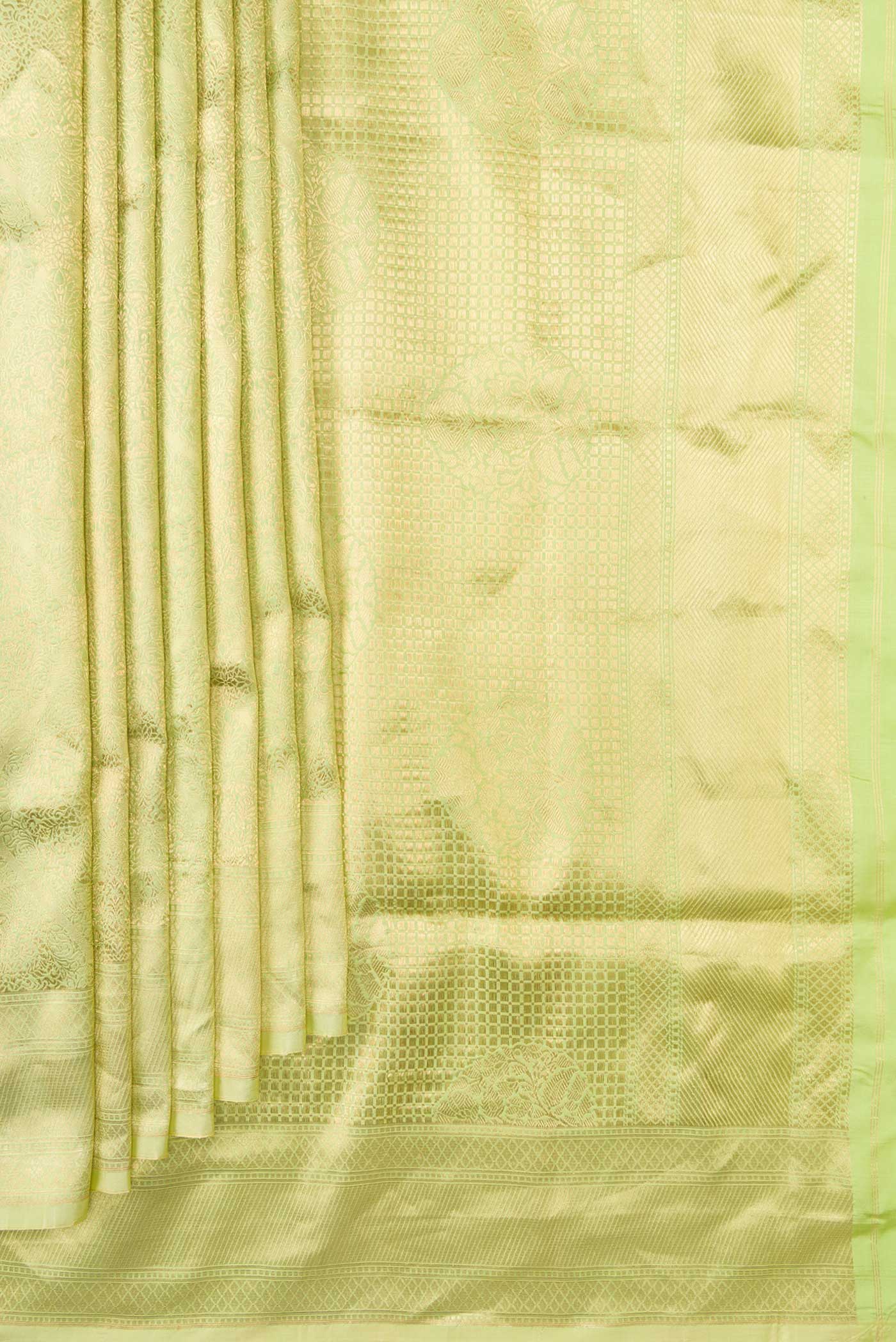 Pleats and pallu of Pista Green Dual Tone Banarasi Silk Saree with Zari Brocade on the body and Zari Border. 