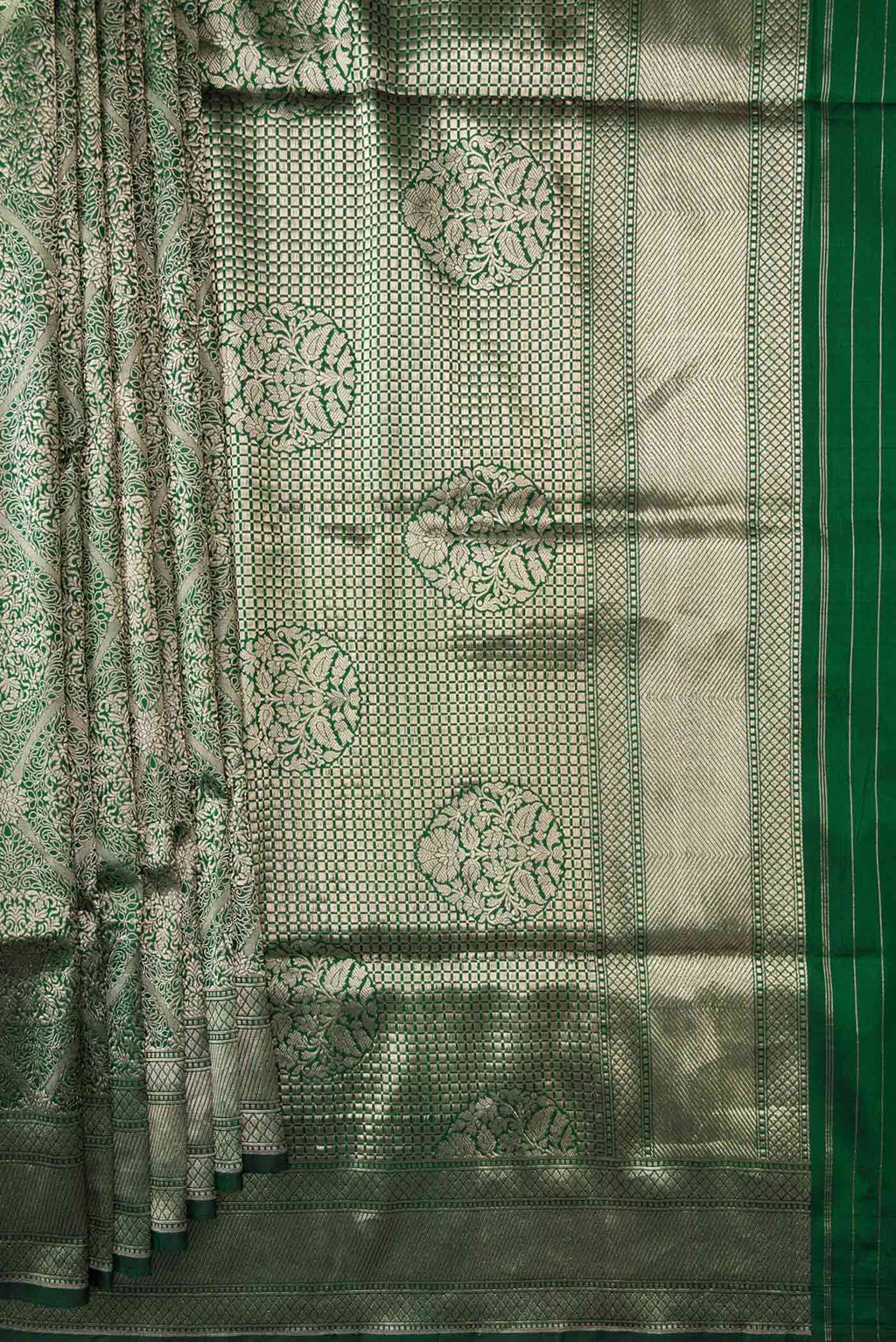 Pleats and pallu of Bottle Green Dual Tone Banarasi Silk Saree with Zari Brocade on the body and Zari Border. 