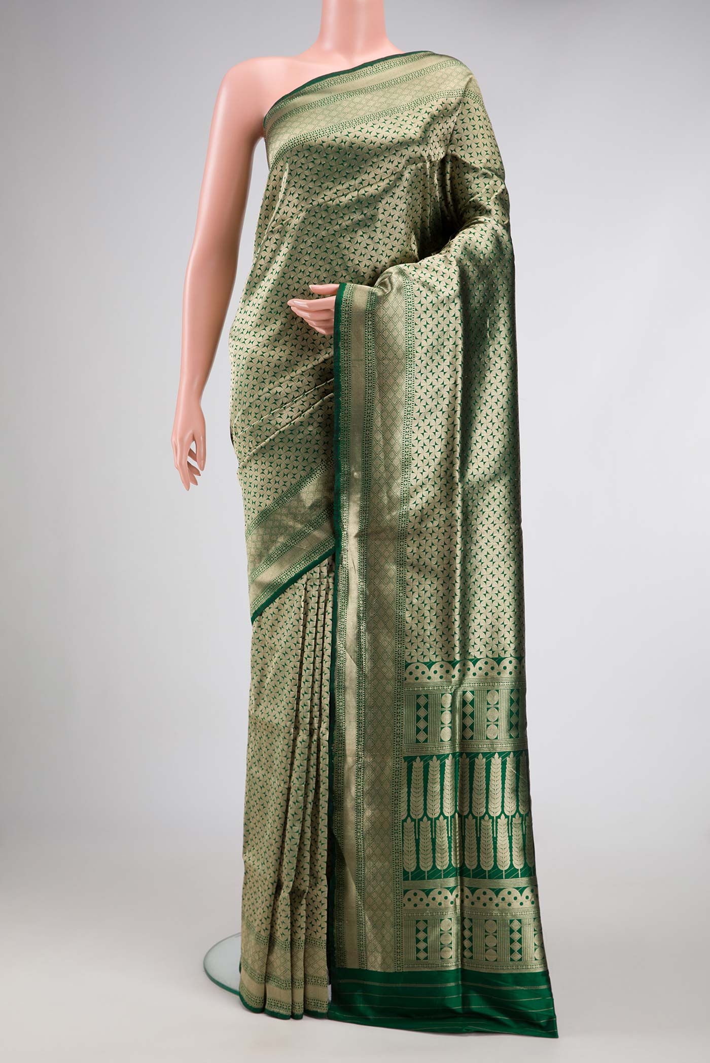 Bottle Green Dual Tone Banarasi Silk Saree with Zari Brocade on the body and Zari Border.  displayed on a mannequin