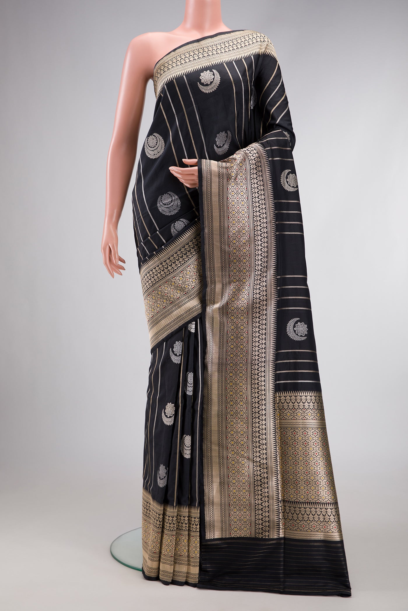Black Dual Tone Banarasi Silk Saree with Zari Butta on the body and Zari Border.  displayed on a mannequin