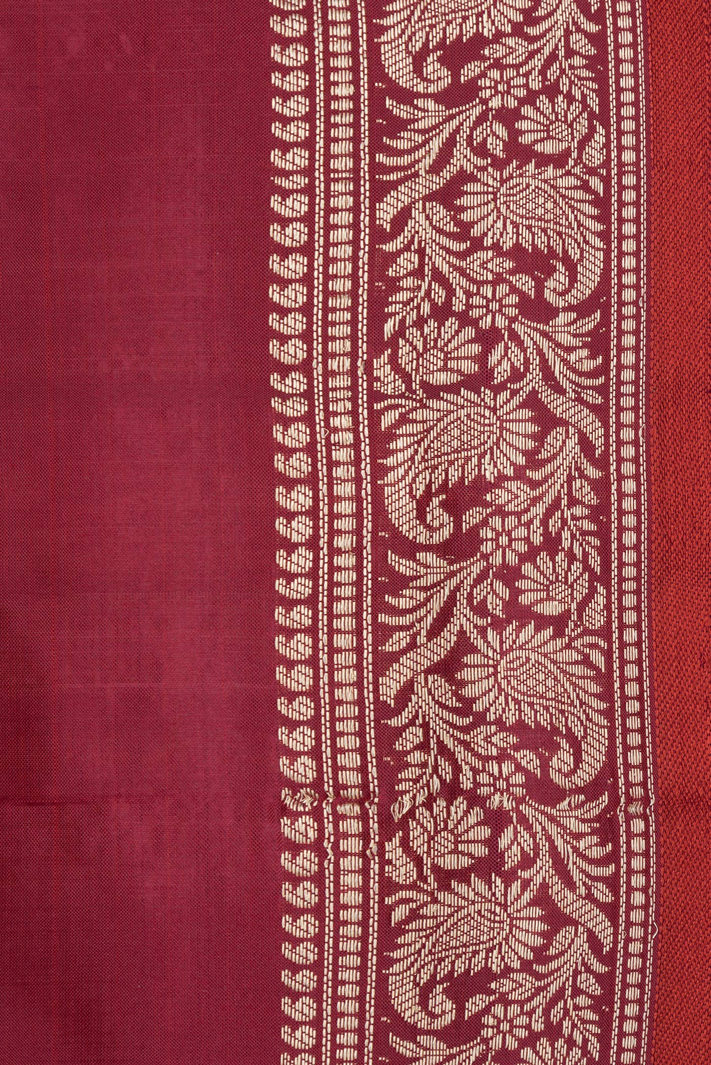 Border image of Maroon Dual Tone Banarasi Silk Saree with Zari Butta on the body and Zari Border. 