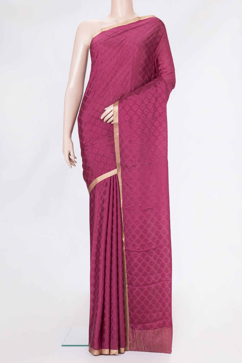 Magenta Dual Tone Georgette Saree with Jacquard design on the body and Zari Border.  displayed on a mannequin