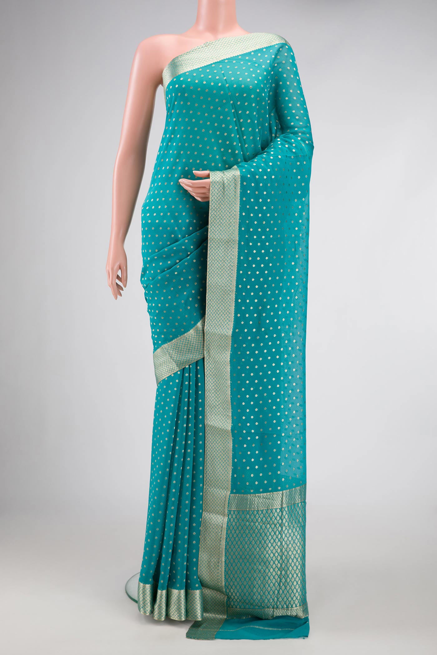 Sky Blue Dual Tone Banarasi Georgette Saree with Zari Butta on the body and Zari Border.  displayed on a mannequin