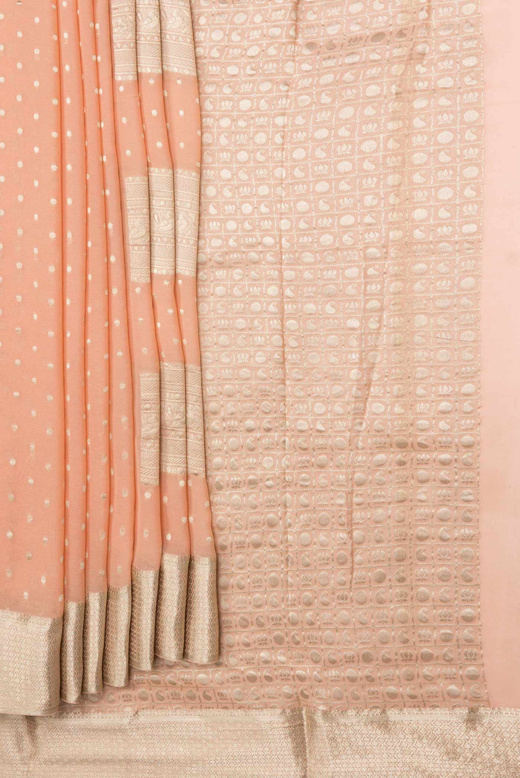 Pleats and pallu of Golden Peach Dual Tone Mysore Georgette Saree with Zari Butta on the body and Zari Border