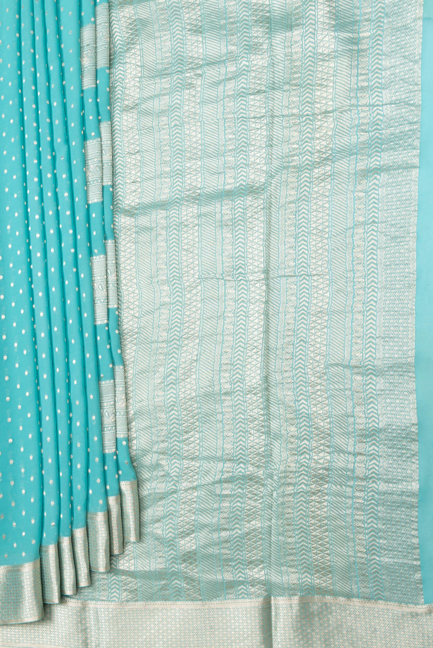Pleats and pallu of Sky Blue Dual Tone Banarasi Georgette Saree with Zari Brocade on the body and Zari Border. 