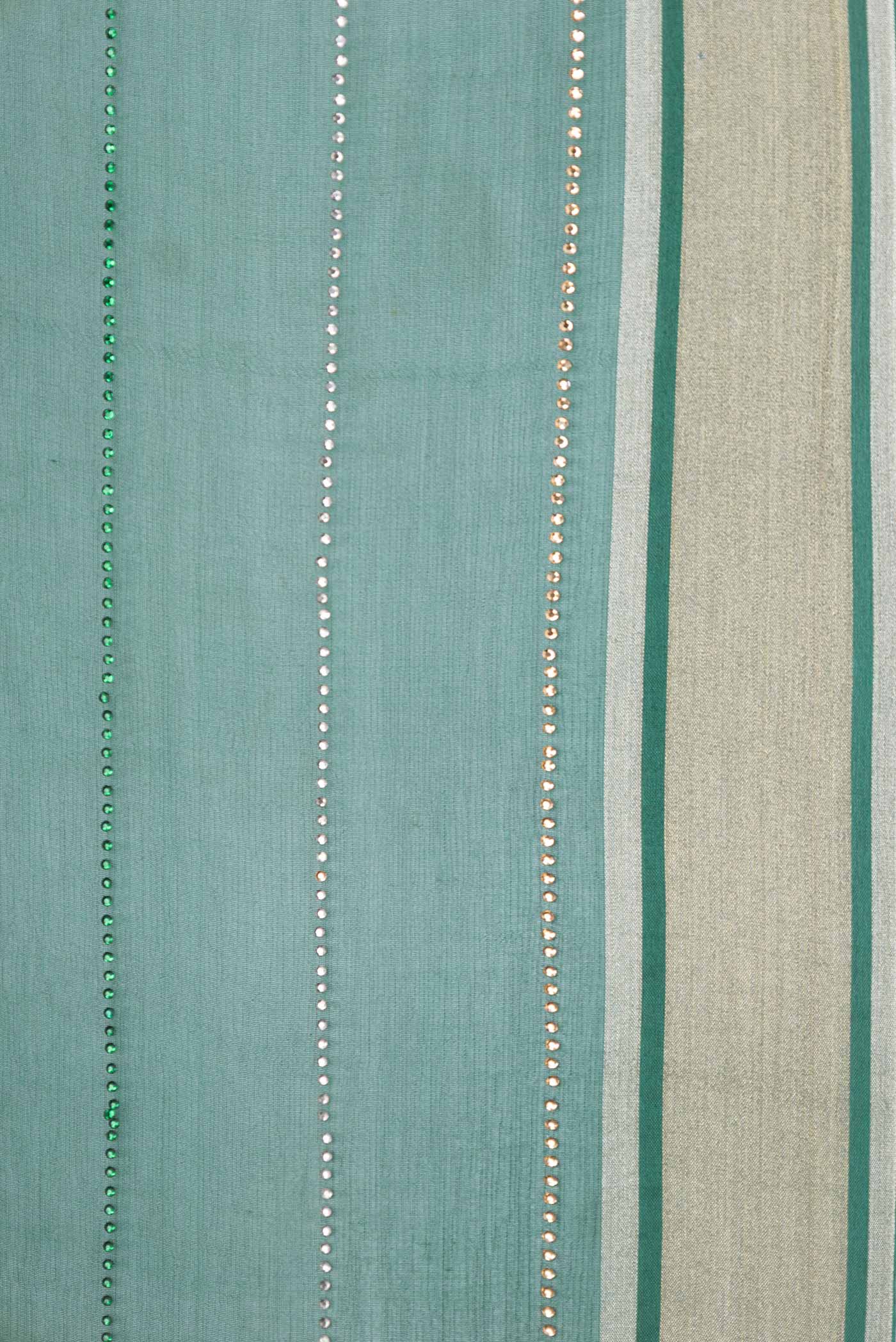 Border image of Bottle Green Dual Tone Chiffon Saree with Embroidery on the body and Zari Border