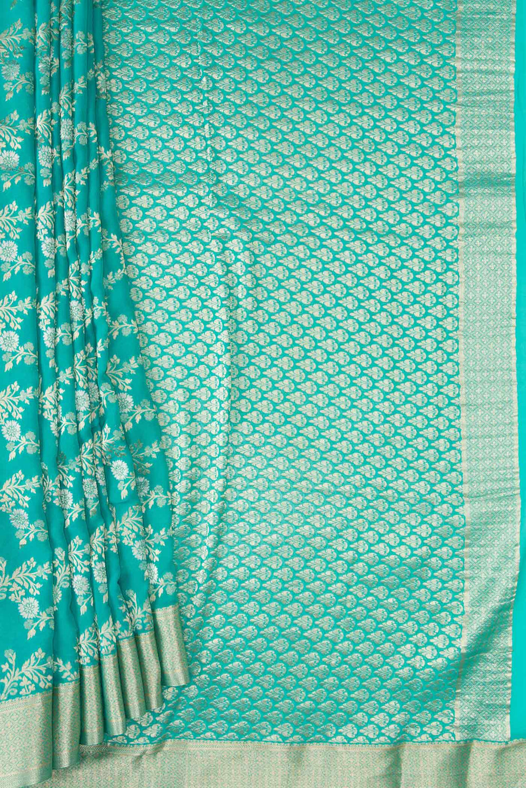 Pleats and pallu of Sky Blue Dual Tone Banarasi Georgette Saree with Zari Brocade on the body and Zari Border. 