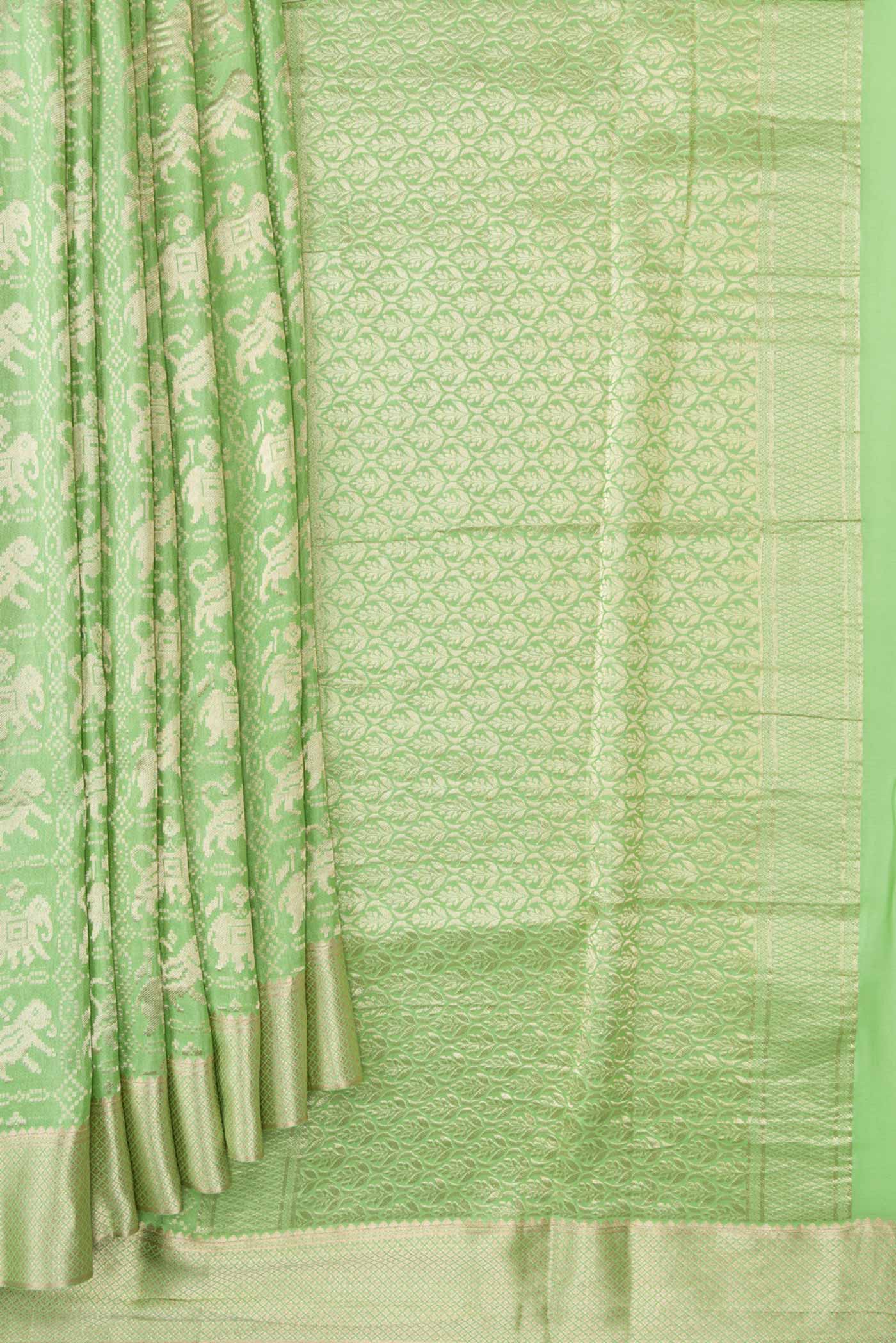 Pleats and pallu of Pista Green Dual Tone Banarasi Georgette Saree with Zari Brocade on the body and Zari Border. 