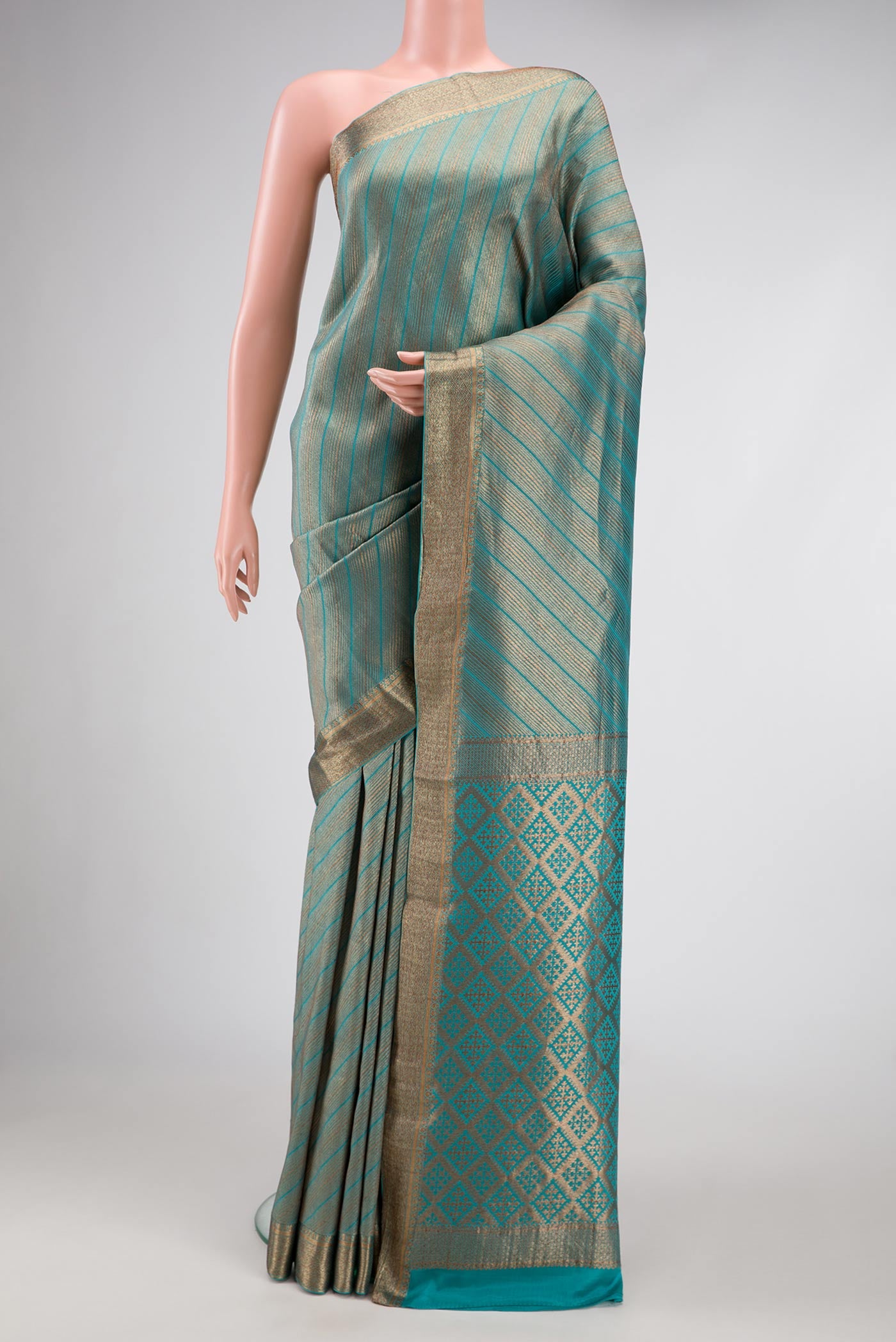 Sky Blue Dual Tone Banarasi Georgette Saree with Zari Brocade on the body and Zari Border.  displayed on a mannequin