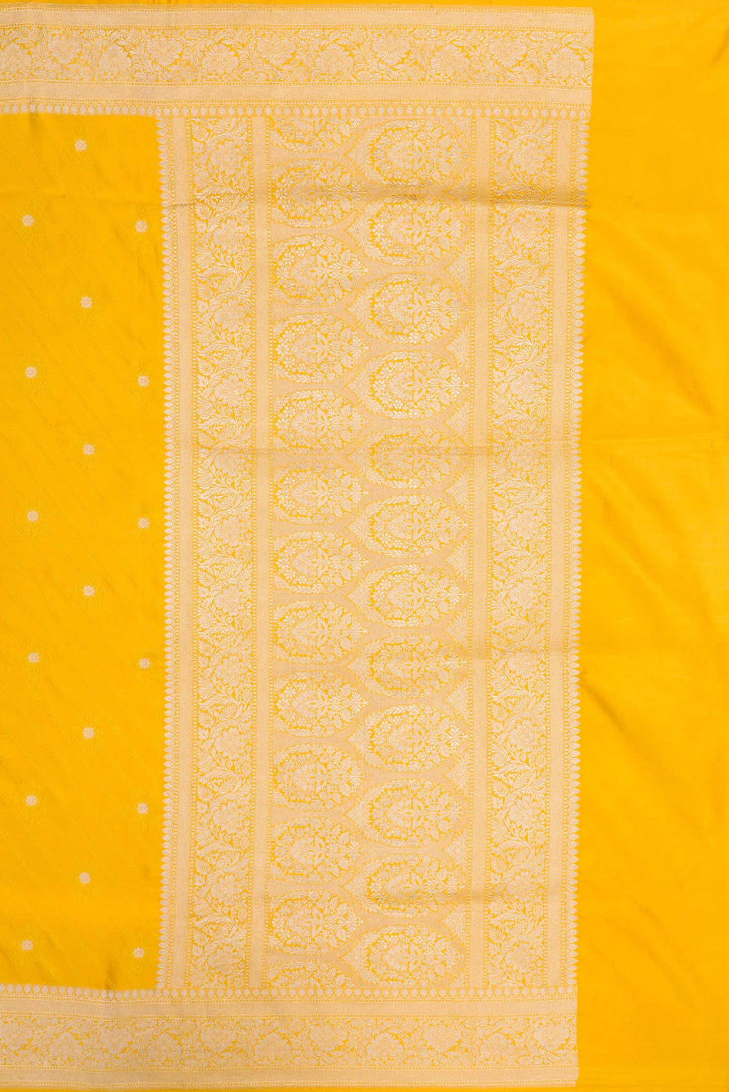 Close up image of the pallu of Pure Silk Pure Zari Mustard Dual Tone Banarasi Saree with Jacquard With Zari Butta on the body and Zari Border