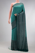 Green Dual Tone Mysore Georgette Saree with Zari Brocade on the body and Zari Border.  displayed on a mannequin