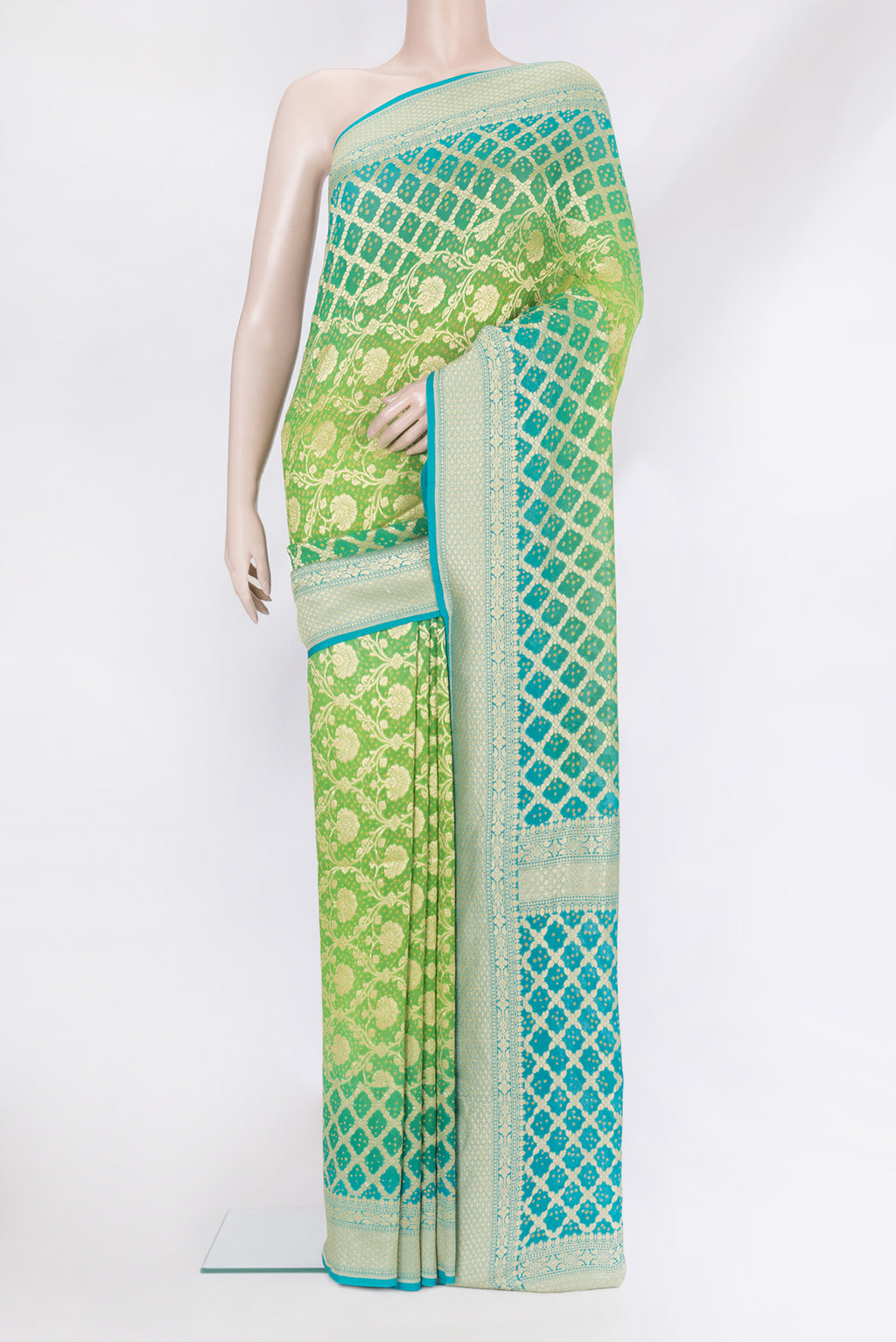 Parrot Green Banarasi Georgette Saree with Zari Brocade on the body and Zari Border.  displayed on a mannequin