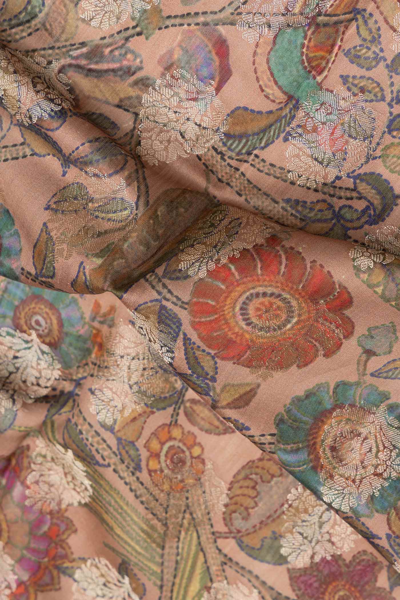 Close up of Brown Dual Tone Tussar Silk Saree with Printed design on the body and Zari Border.  displaying folds
