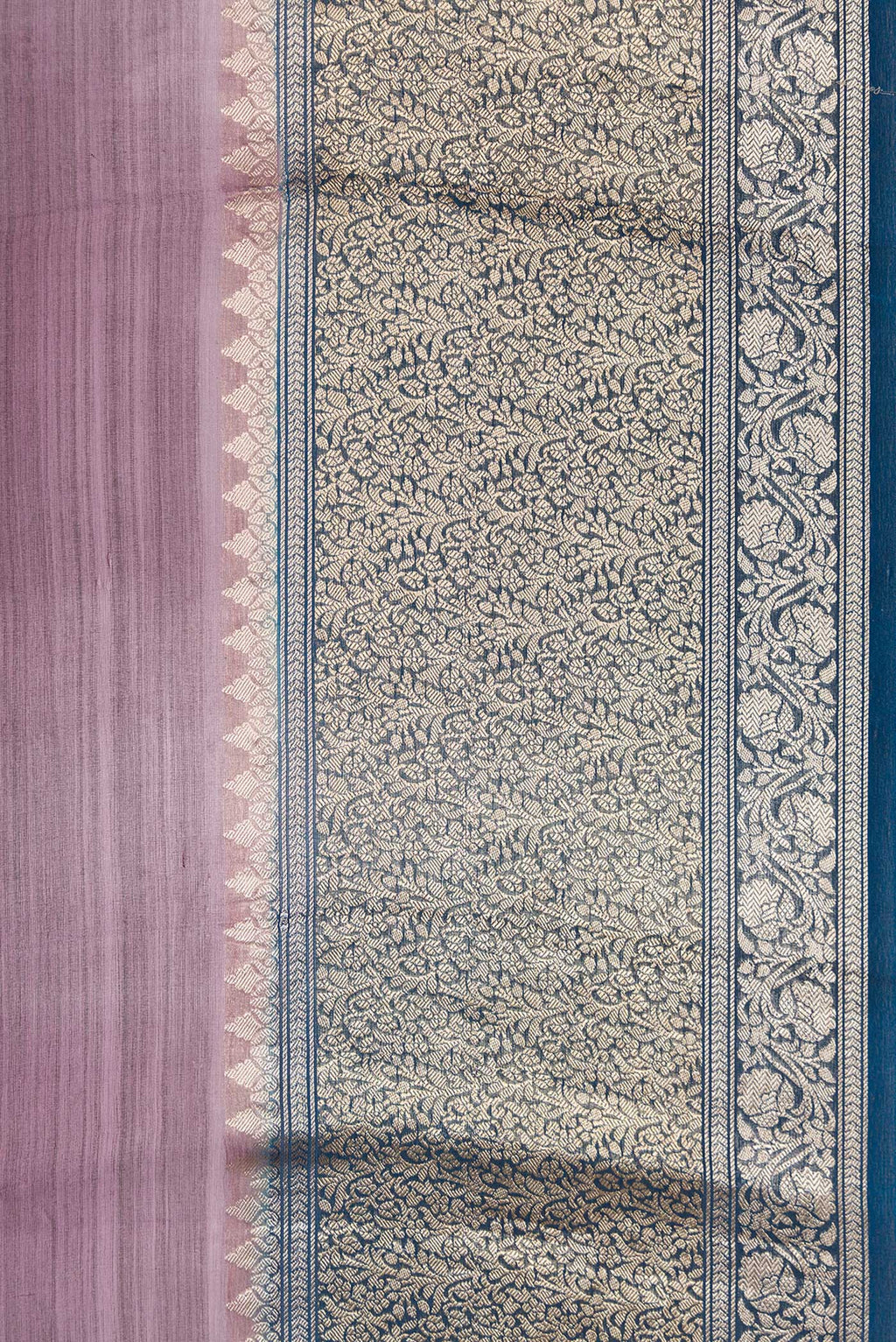 Border image of Burgundy Dual Tone Organza Silk Saree with Printed design on the body and Zari Border. 