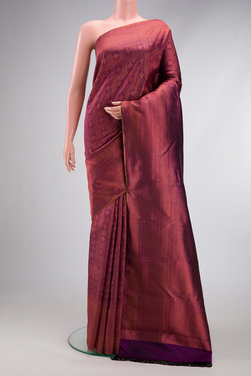Purple Dual Tone Kanchipuram Silk Saree with Zari Brocade on the body and Fancy Border.  displayed on a mannequin
