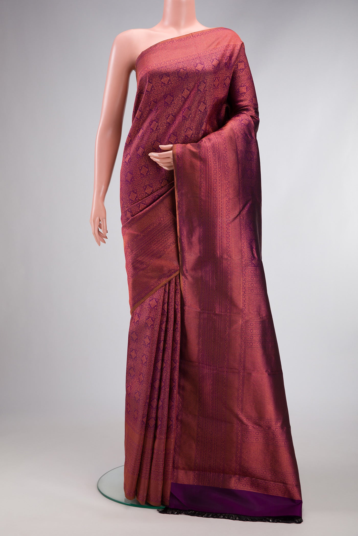 Purple Dual Tone Kanchipuram Silk Saree with Zari Brocade on the body and Fancy Border.  displayed on a mannequin