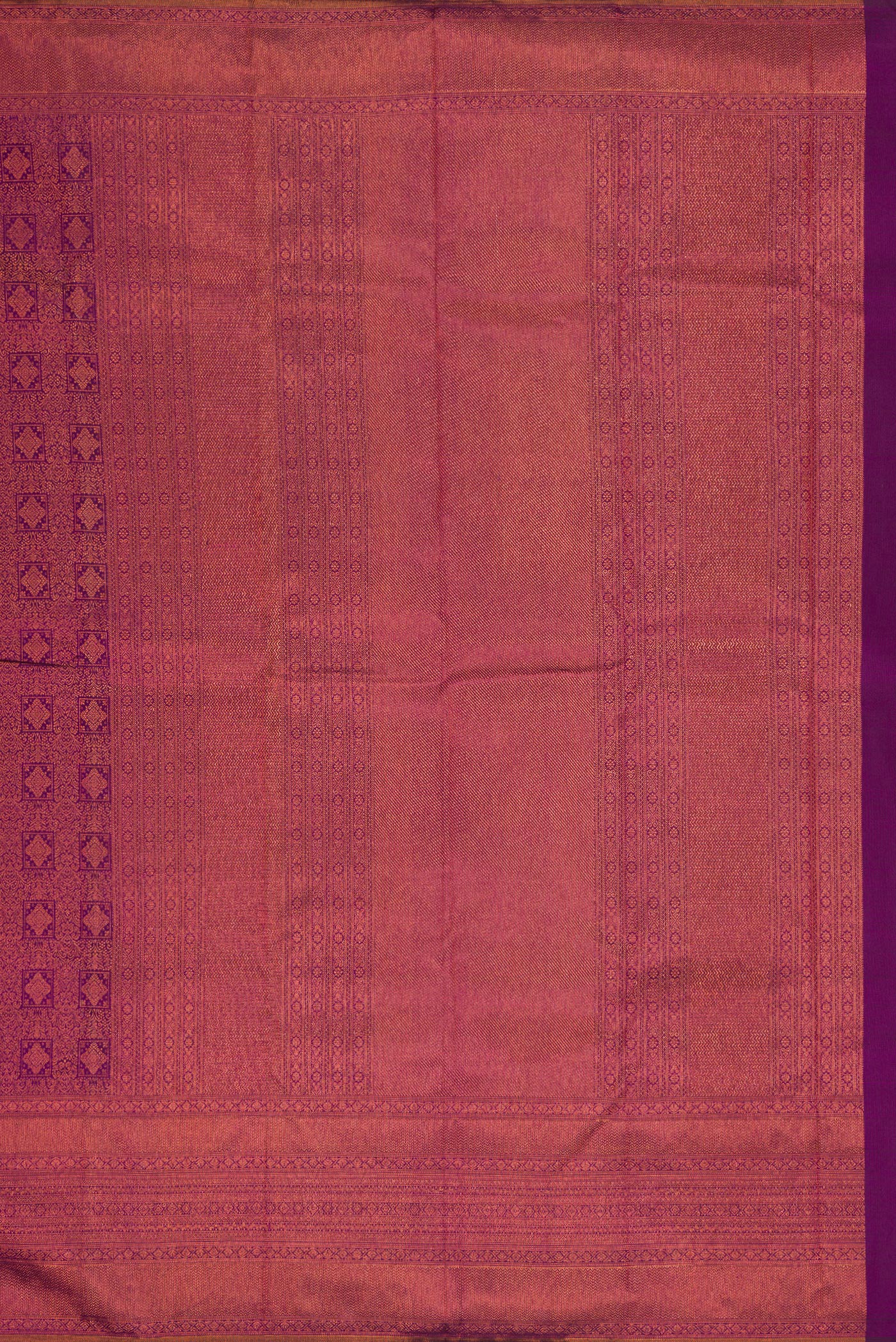 Close up image of the pallu of Purple Dual Tone Kanchipuram Silk Saree with Zari Brocade on the body and Fancy Border. 