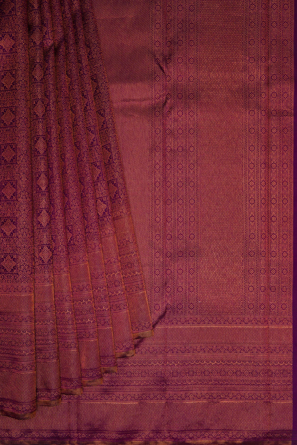 Pleats and pallu of Purple Dual Tone Kanchipuram Silk Saree with Zari Brocade on the body and Fancy Border. 