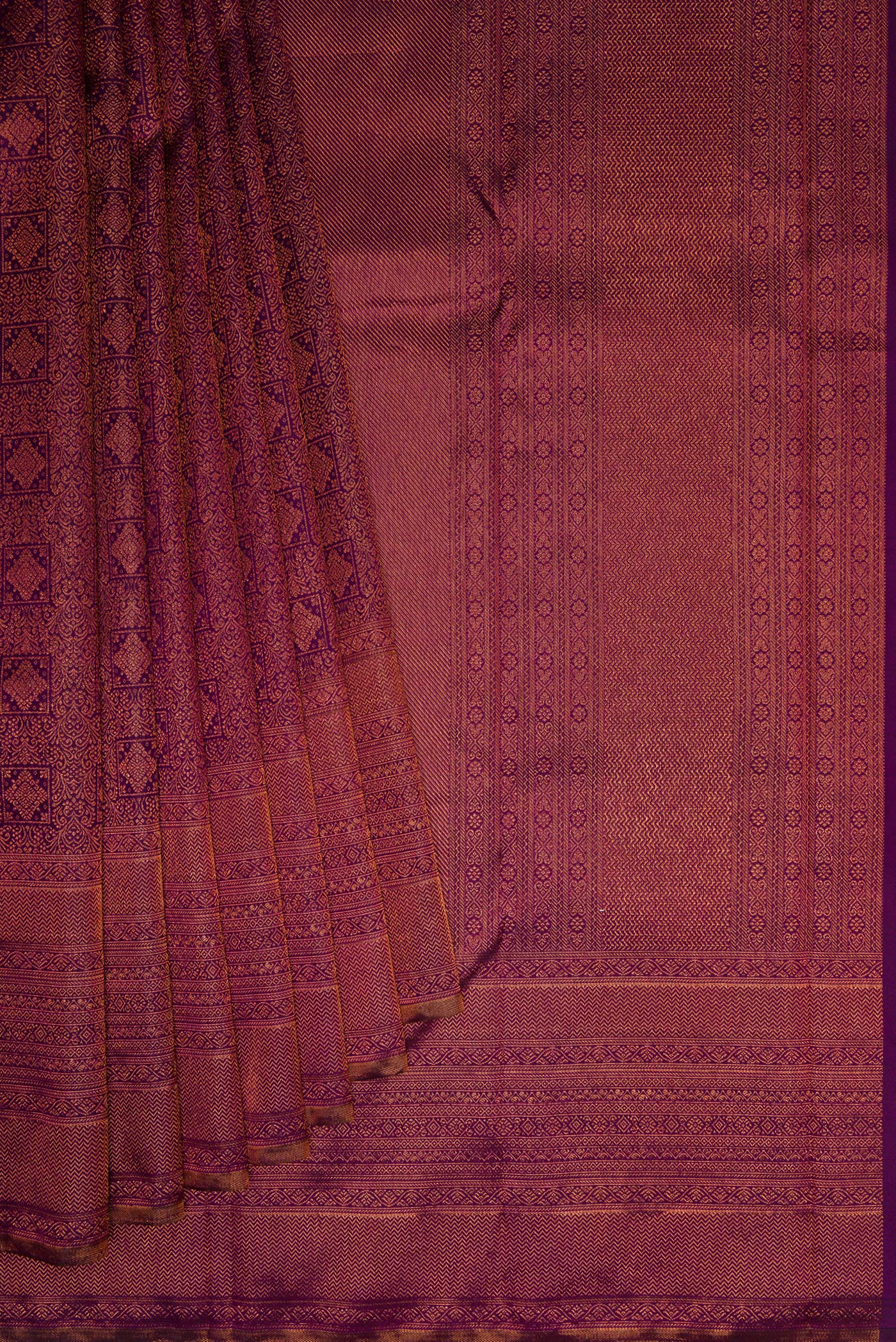 Pleats and pallu of Purple Dual Tone Kanchipuram Silk Saree with Zari Brocade on the body and Fancy Border. 