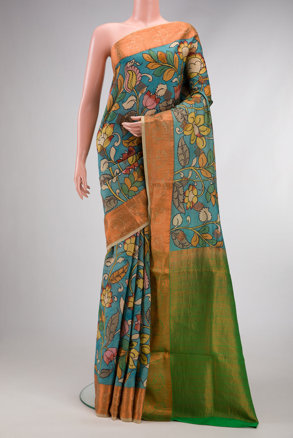 Blue Dual Tone Kanchipuram Silk Saree with kalamkari Print on the body and Zari Border.  displayed on a mannequin