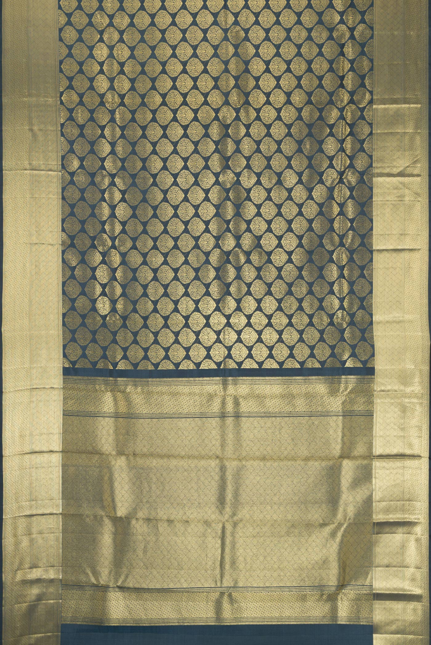 Flat view of Grey Dual Tone Kanchipuram Silk Saree with Zari Brocade on the body and Zari Border. 