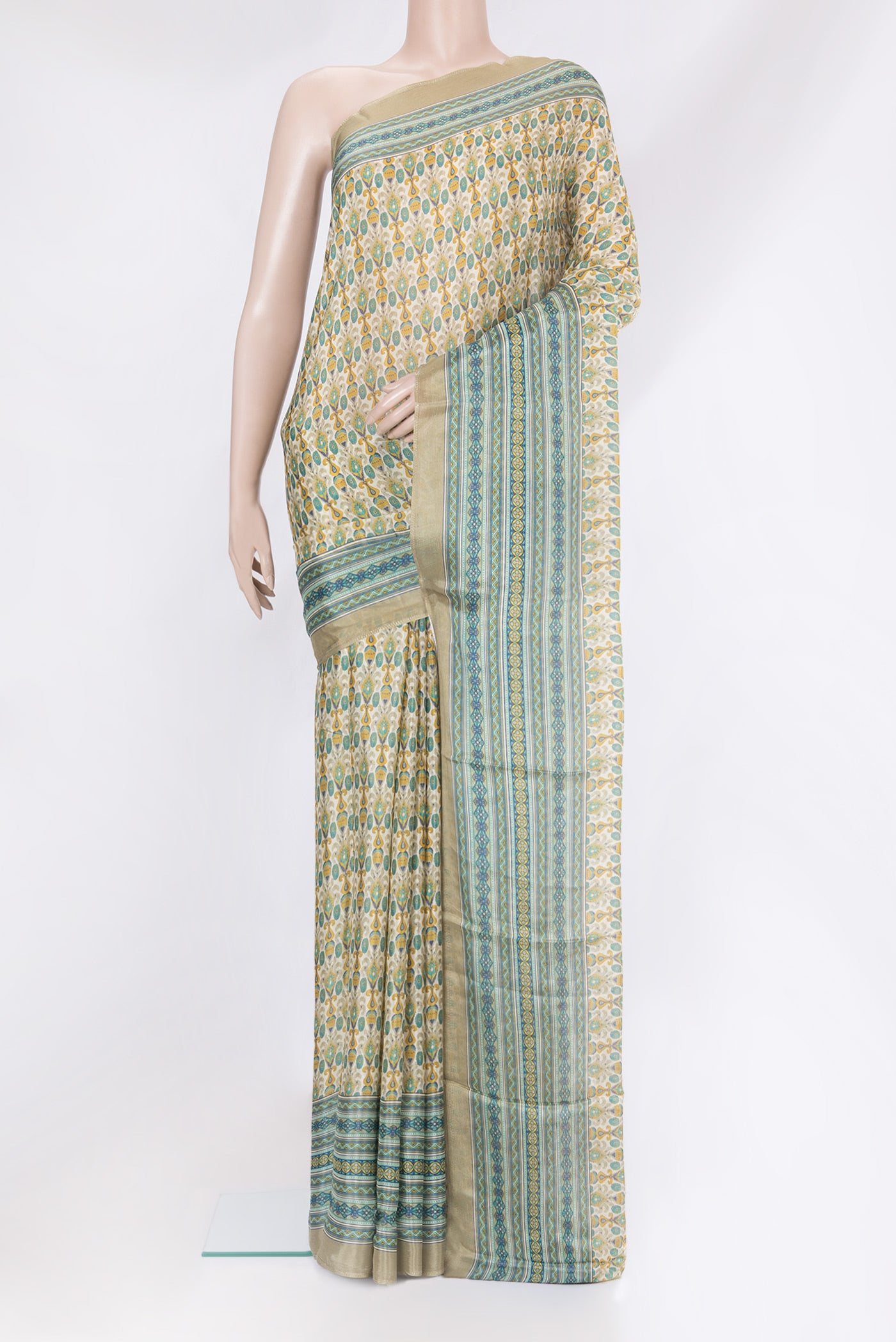Beige Blended Crepe Saree with Printed design on the body and Printed Border.  displayed on a mannequin