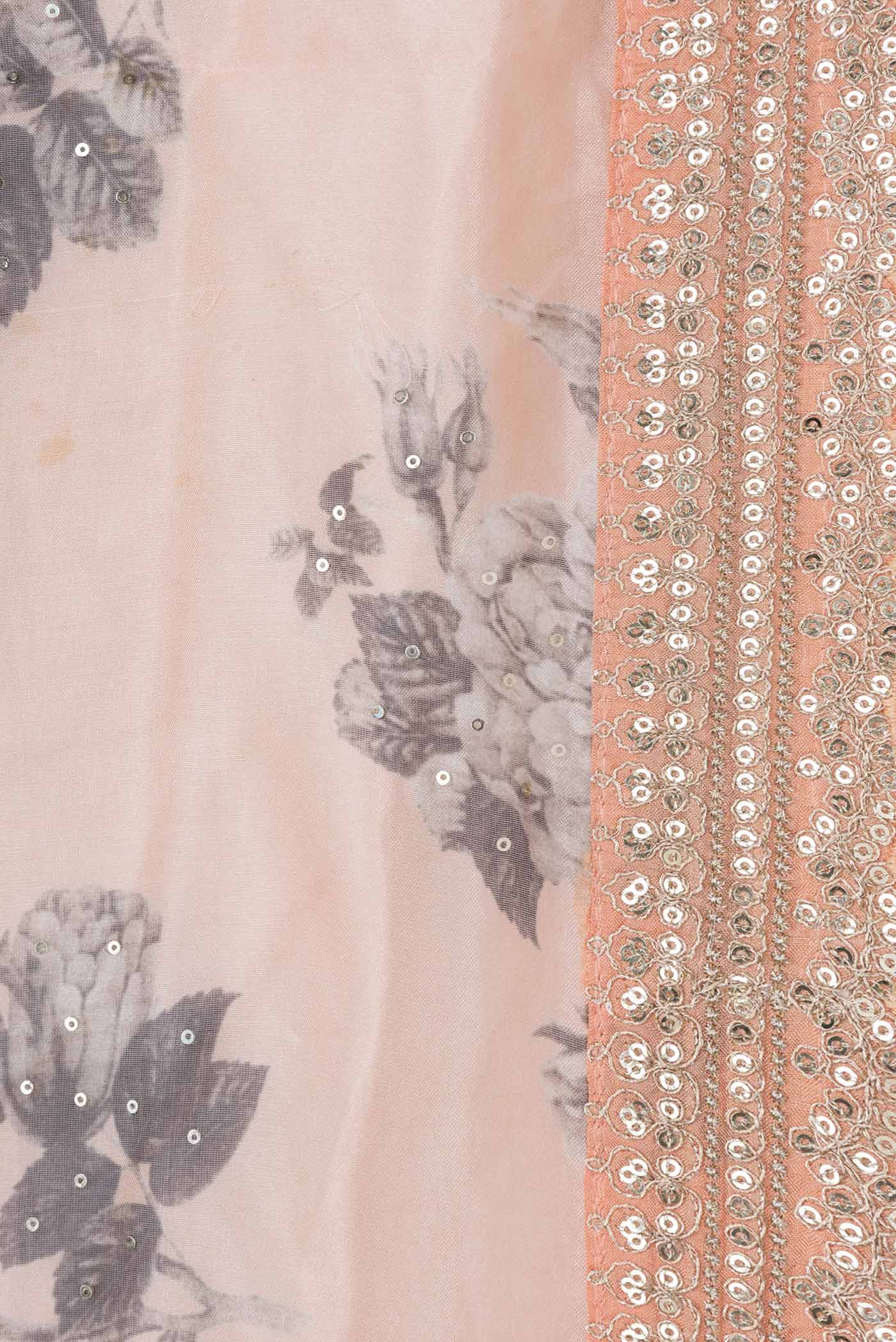 Border image of Peach Dual Tone Organza Silk Saree with Zari Butta on the body and Zari Border. 