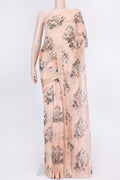 Peach Dual Tone Organza Silk Saree with Zari Butta on the body and Zari Border.  displayed on a mannequin