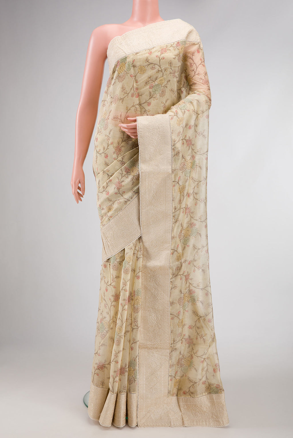 Sandal Dual Tone Chanderi Silk Saree with Printed design on the body and Embroidery Border.  displayed on a mannequin