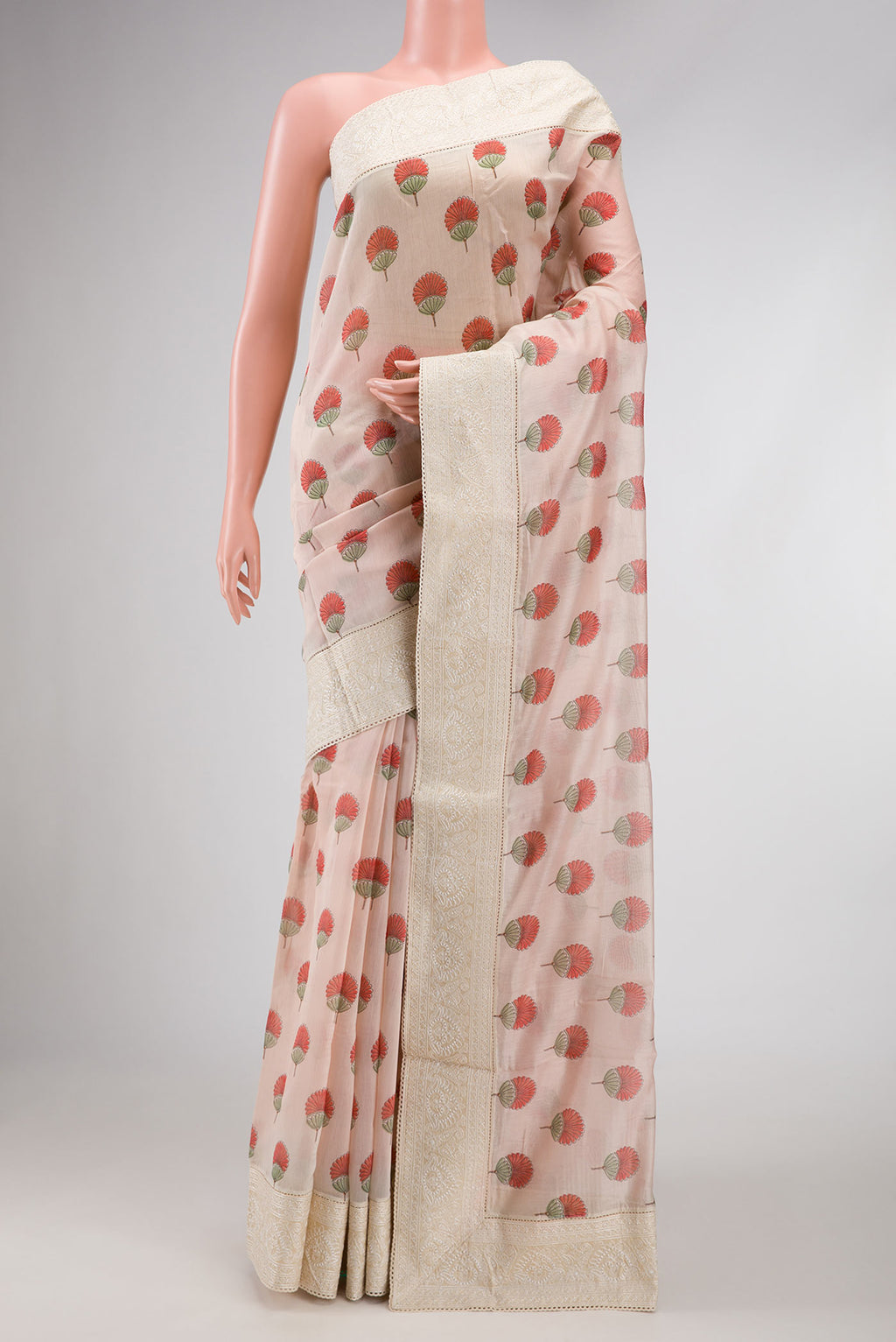 Golden Peach Dual Tone Chanderi Silk Saree with Printed design on the body and Embroidery Border.  displayed on a mannequin