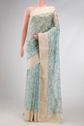 Light Blue Dual Tone Chanderi Silk Saree with Printed design on the body and Embroidery Border.  displayed on a mannequin