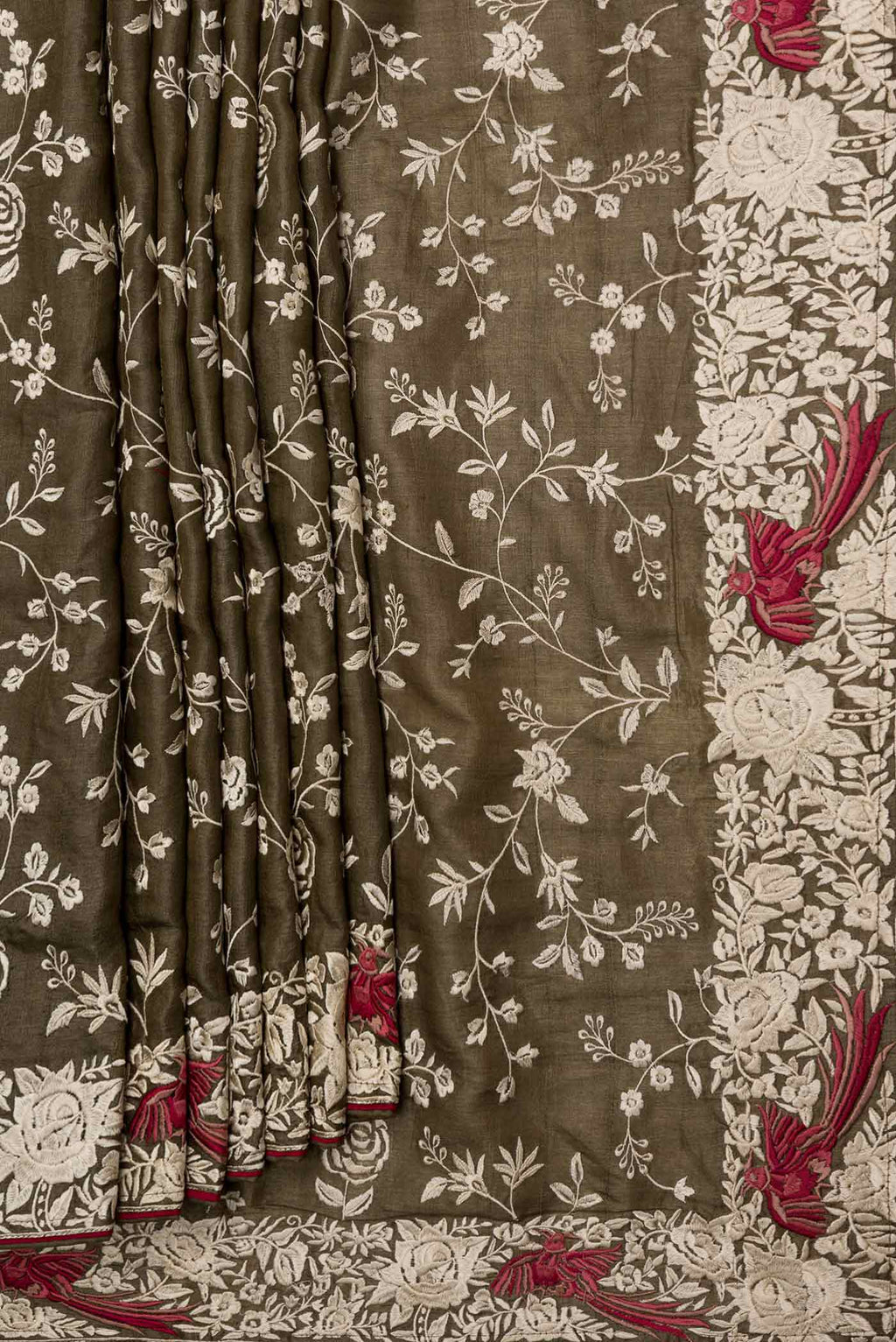 Pleats and pallu of Mehandi Green Dual Tone Tussar Saree with Embroidery on the body and Embroidery Border