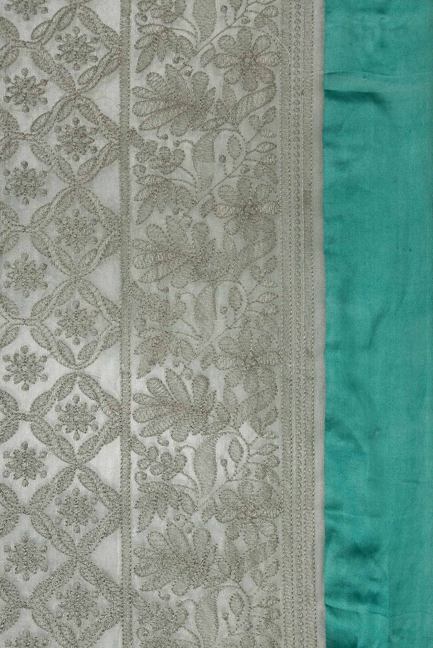 Border image of Grey Dual Tone Mysore Georgette Saree with Embroidery on the body and Plain Border. 