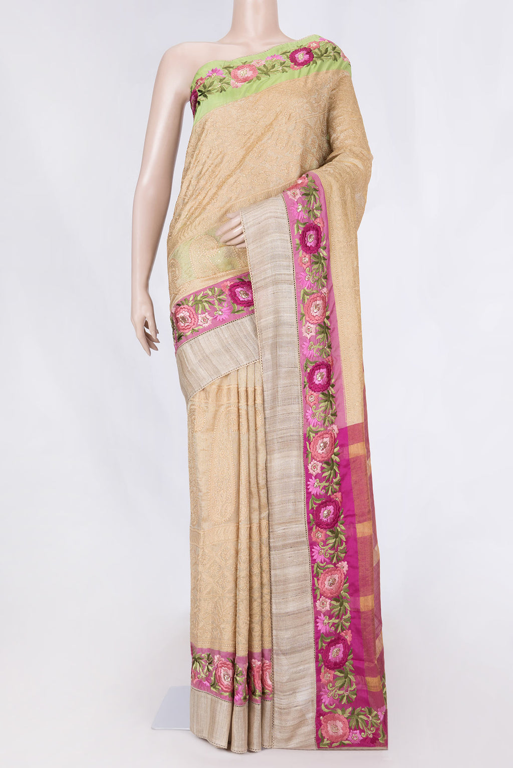 Beige Tussar Silk Saree with Embroidery on the body and Embroidery Border displayed on a mannequin