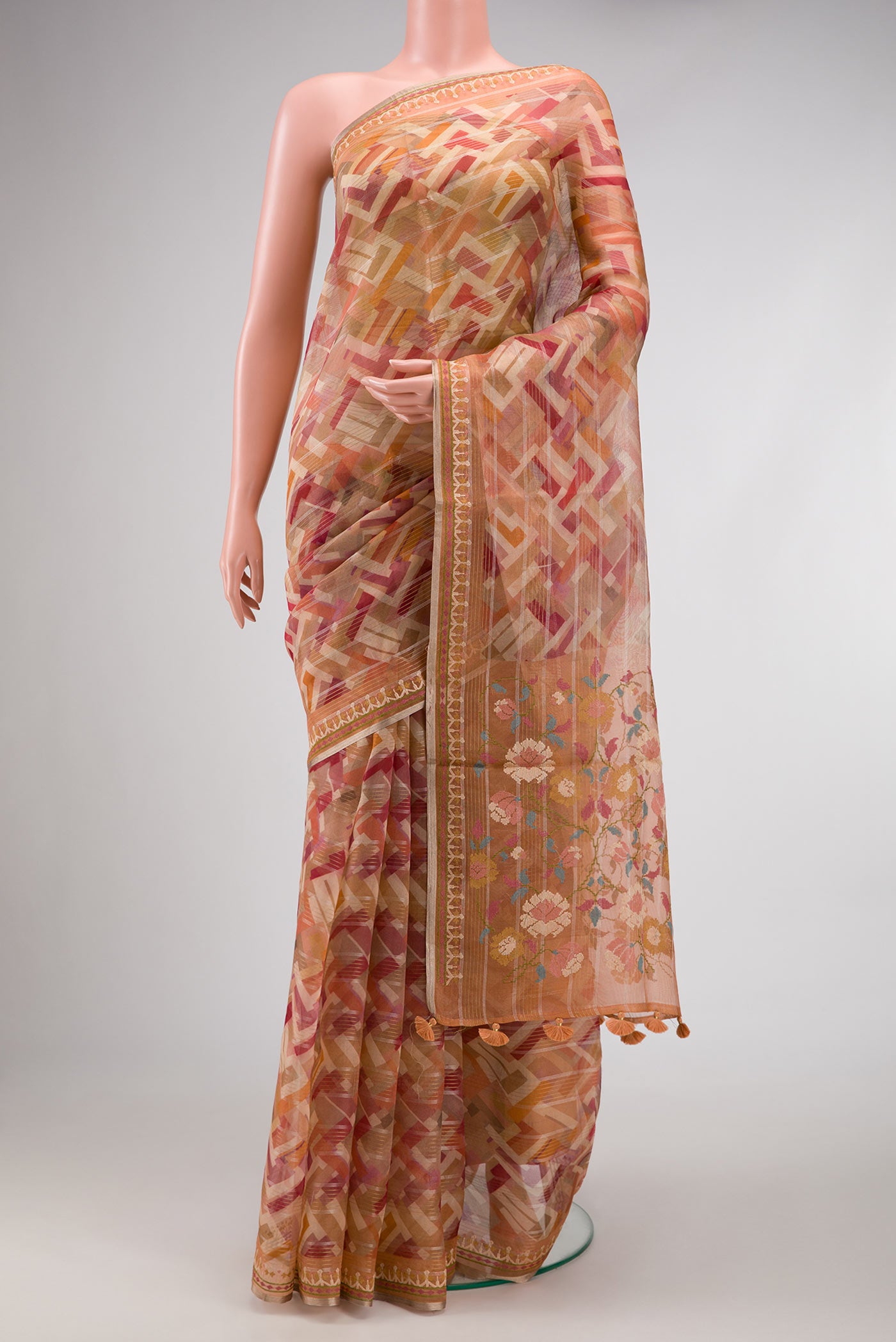 Brown Dual Tone Organza Silk Saree with Printed design on the body and Embroidery Border.  displayed on a mannequin