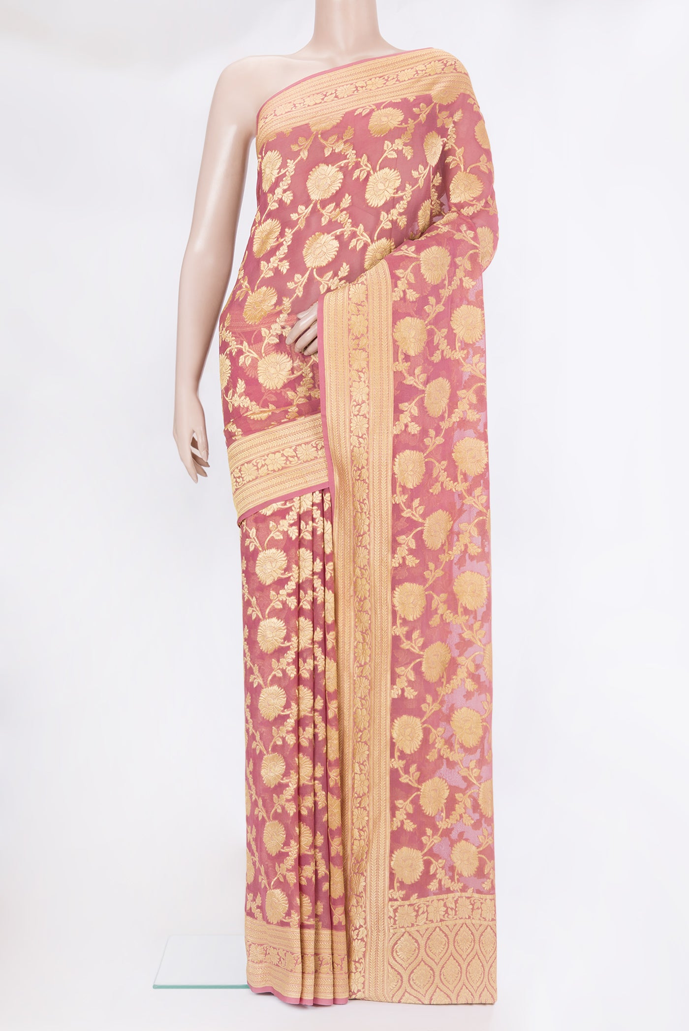 Pink Banarasi Georgette Saree with Zari Brocade on the body and Zari Border.  displayed on a mannequin