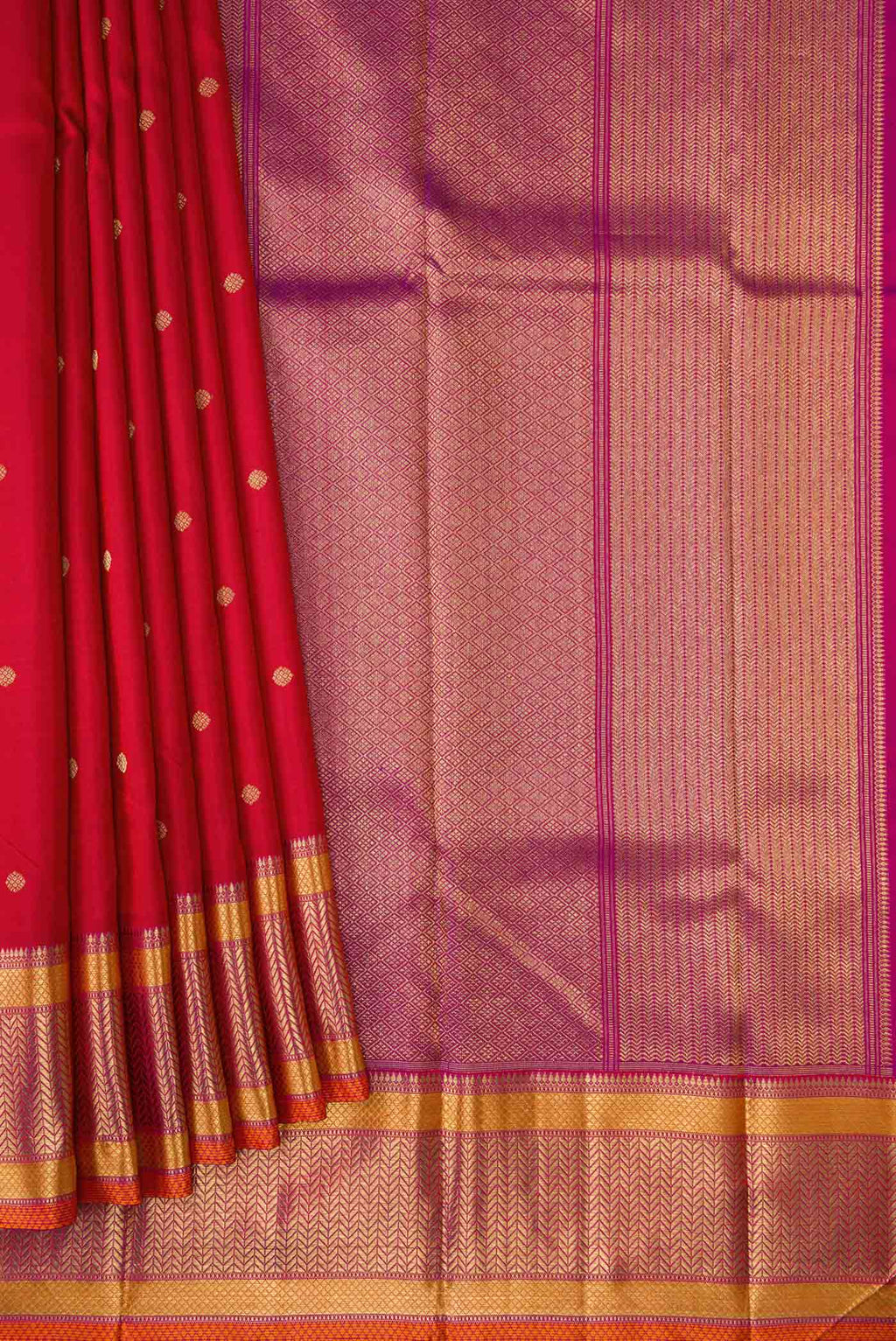 Pleats and pallu of Pure Silk Pure Zari Red Dual Tone Kanchipuram Saree with Zari Butta on the body and Zari Border