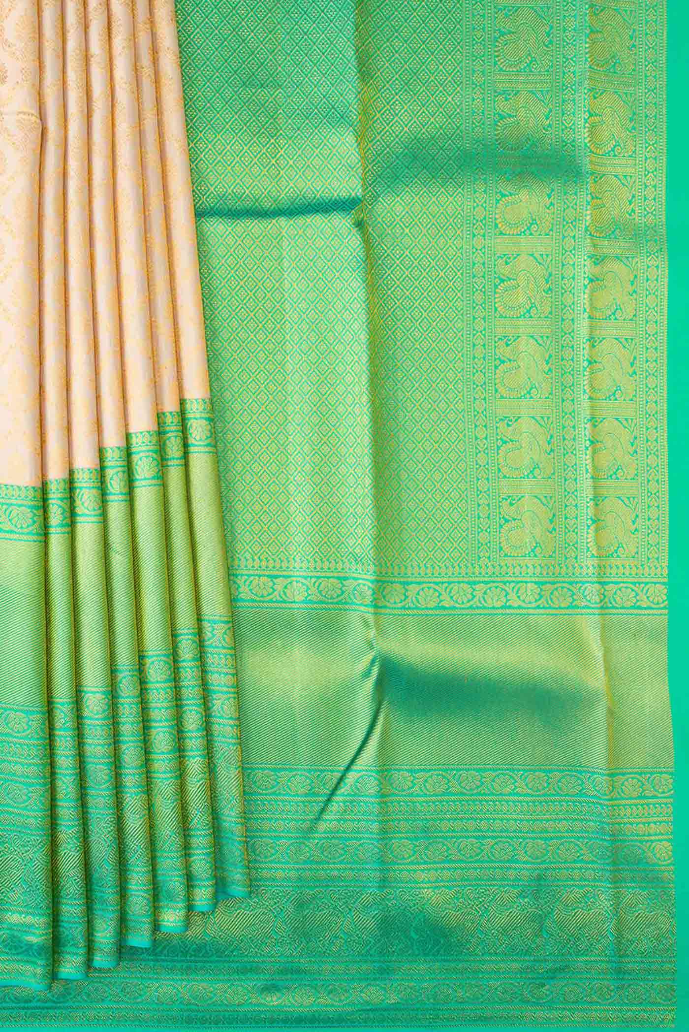 Pleats and pallu of Sandal Dual Tone Kanchipuram Saree with Zari Brocade on the body and Zari Border