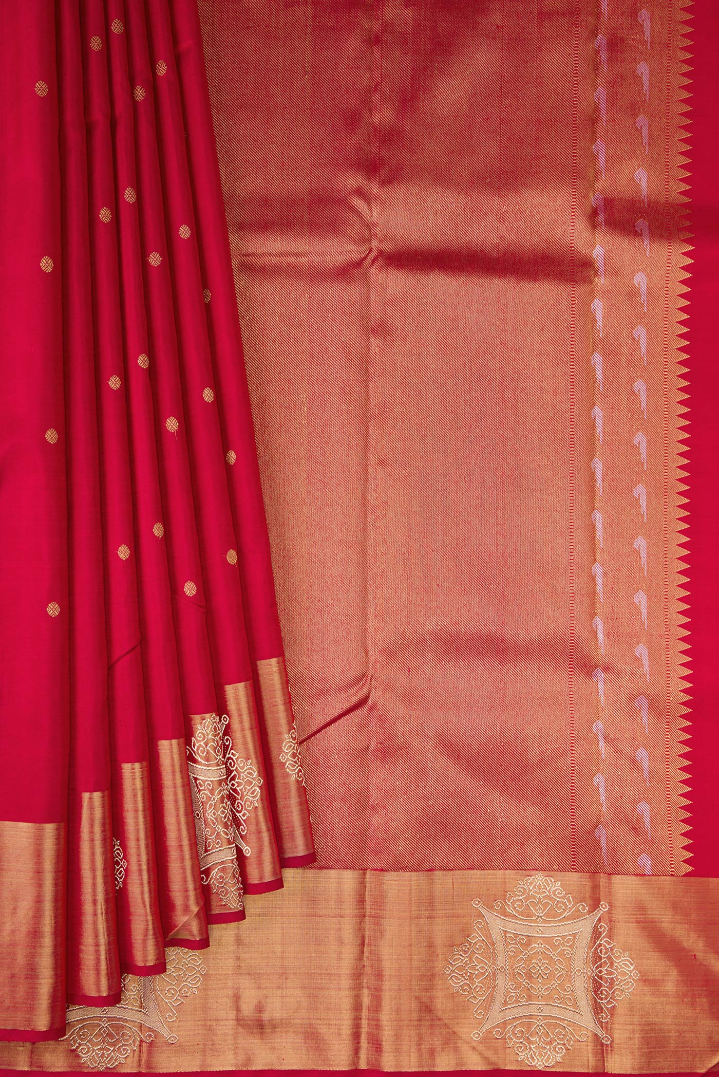 Pleats and pallu of Pure Silk Pure Zari Maroon Kanchipuram Saree with Zari Butta on the body and Fancy Border. 