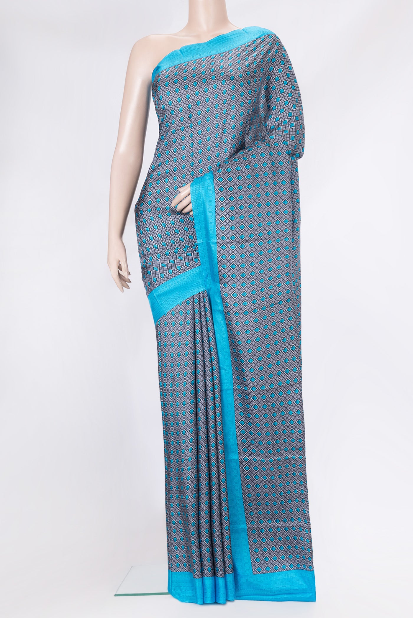 Grey Dual Tone Printed Silk Nine Yards Saree with Printed design on the body and Printed Border.  displayed on a mannequin