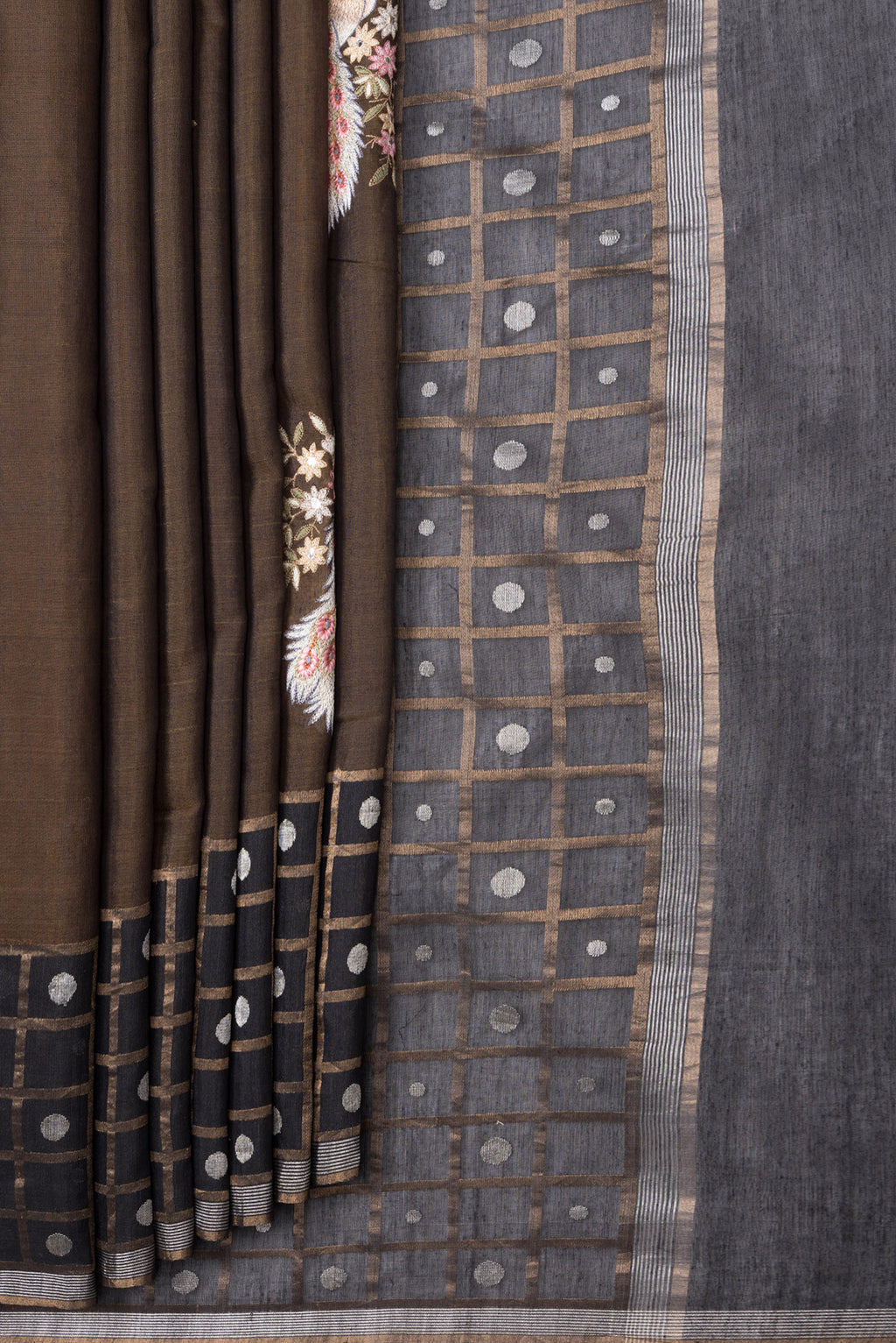 Pleats and pallu of Brown Dual Tone Tussar Silk Saree with Embroidery on the body and Checks Border. 