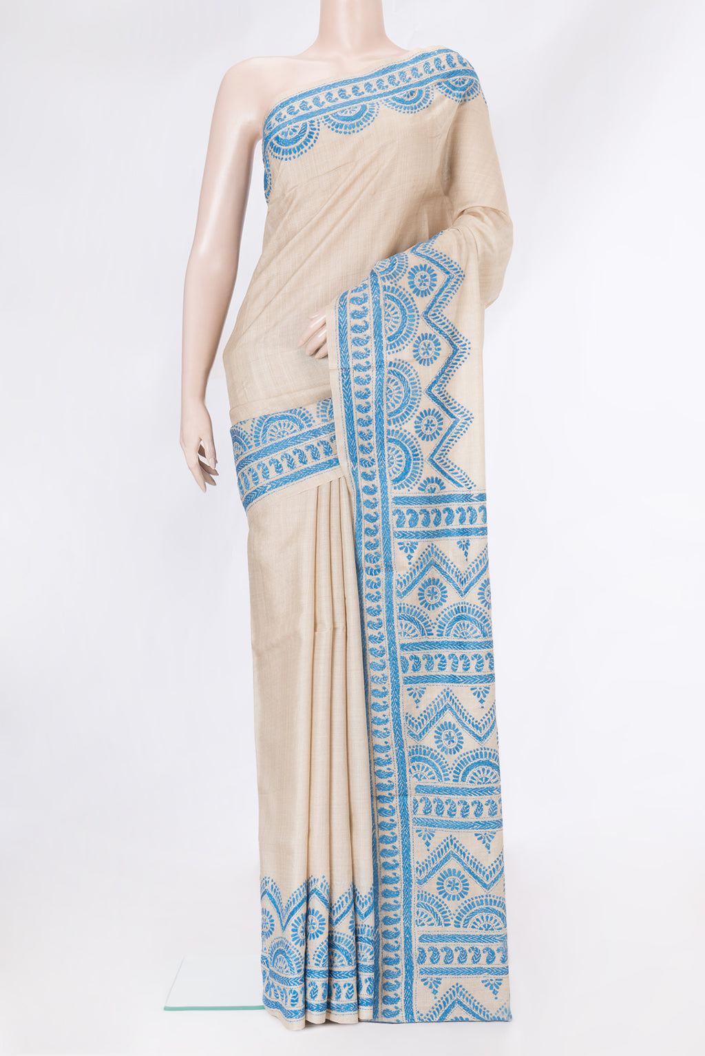 Beige Dual Tone Tussar Silk Saree with Plain Body and Embroidery Border.  displayed on a mannequin