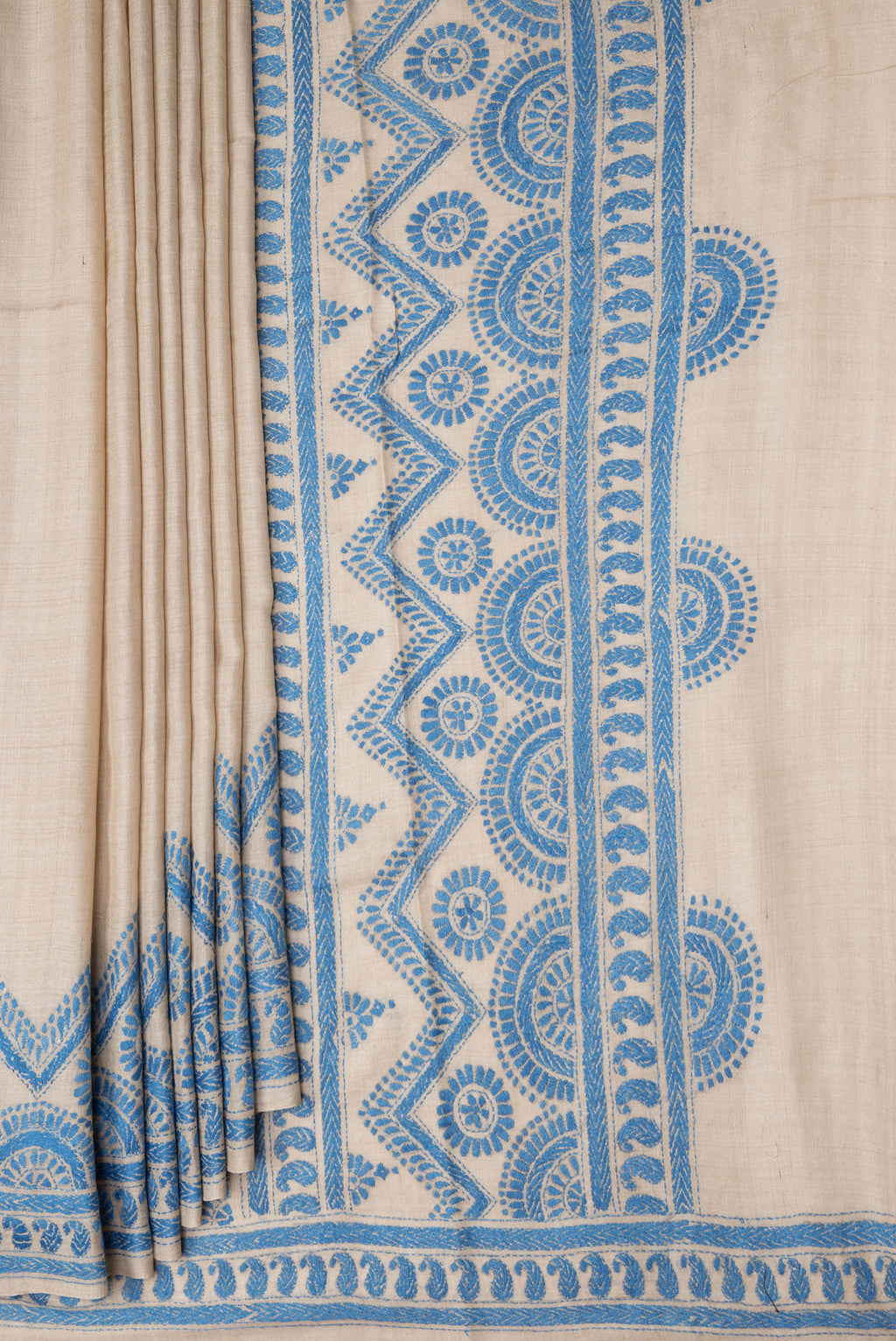 Pleats and pallu of Beige Dual Tone Tussar Silk Saree with Plain Body and Embroidery Border. 