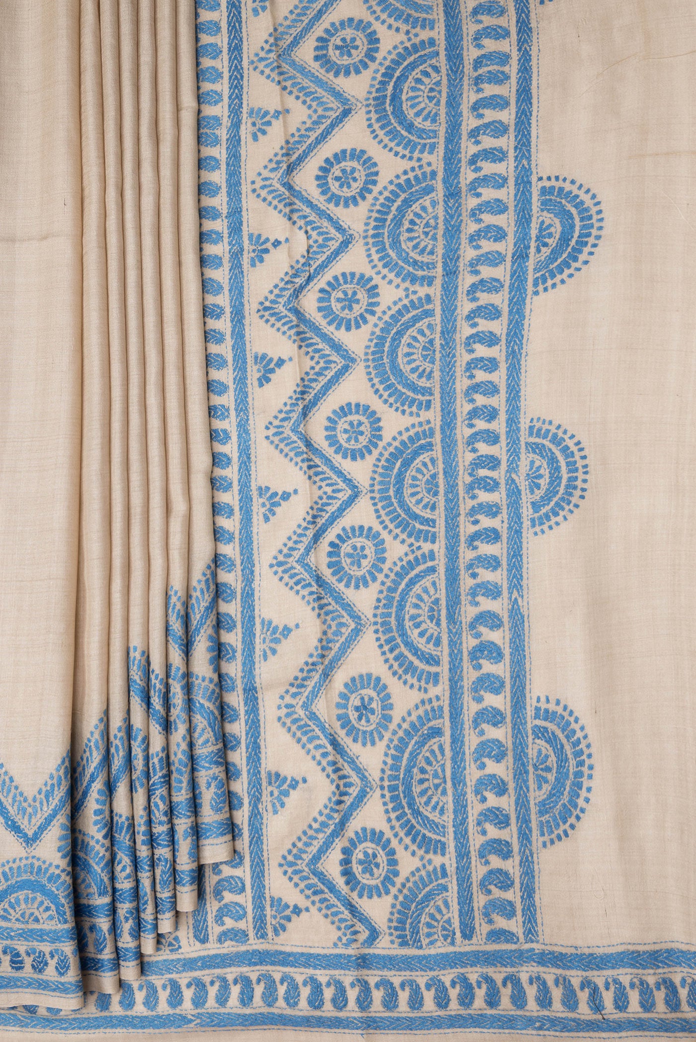 Pleats and pallu of Beige Dual Tone Tussar Silk Saree with Plain Body and Embroidery Border. 