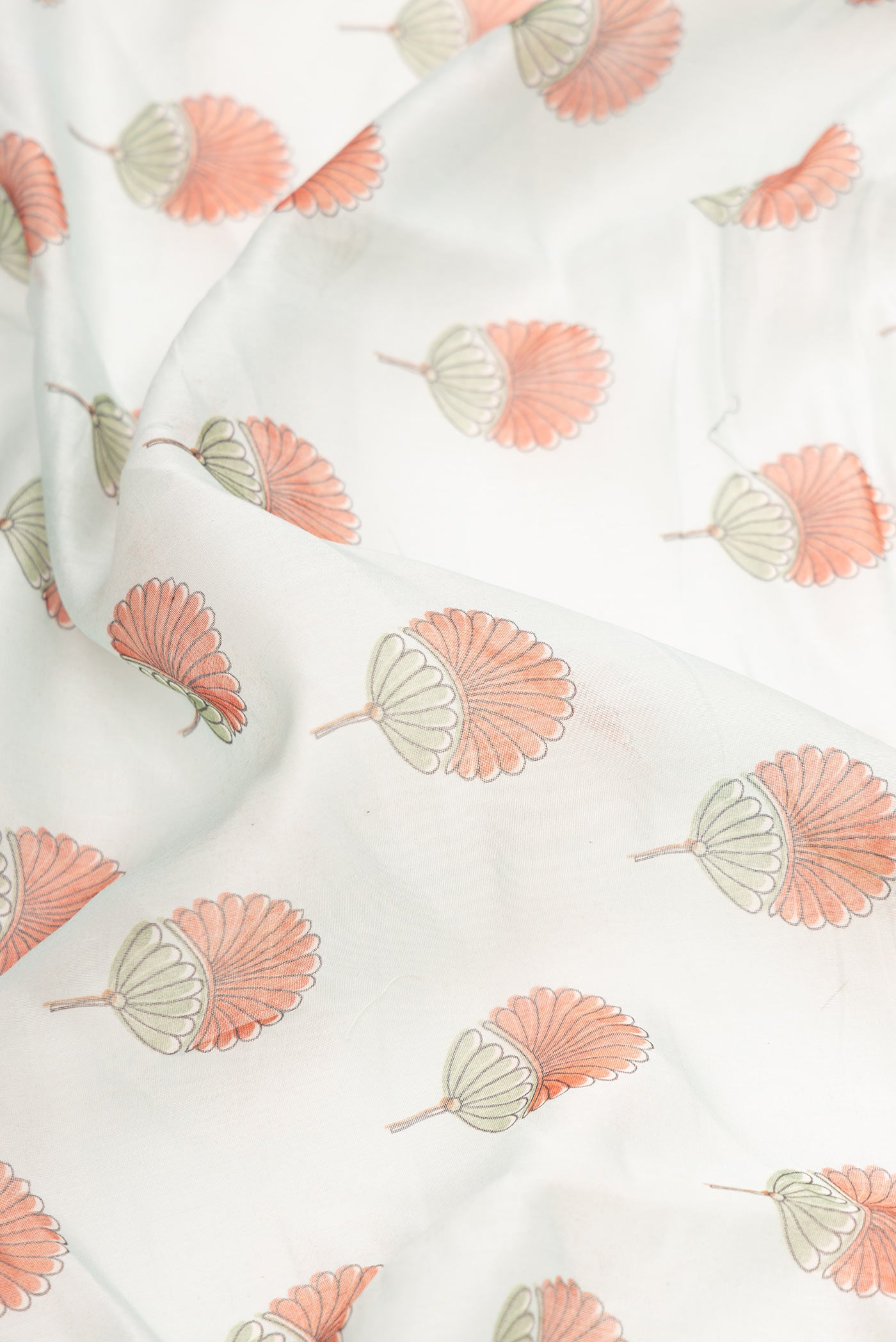 Close up of Grey Dual Tone Chanderi Silk Saree with Printed design on the body and Embroidery Border.  displaying folds