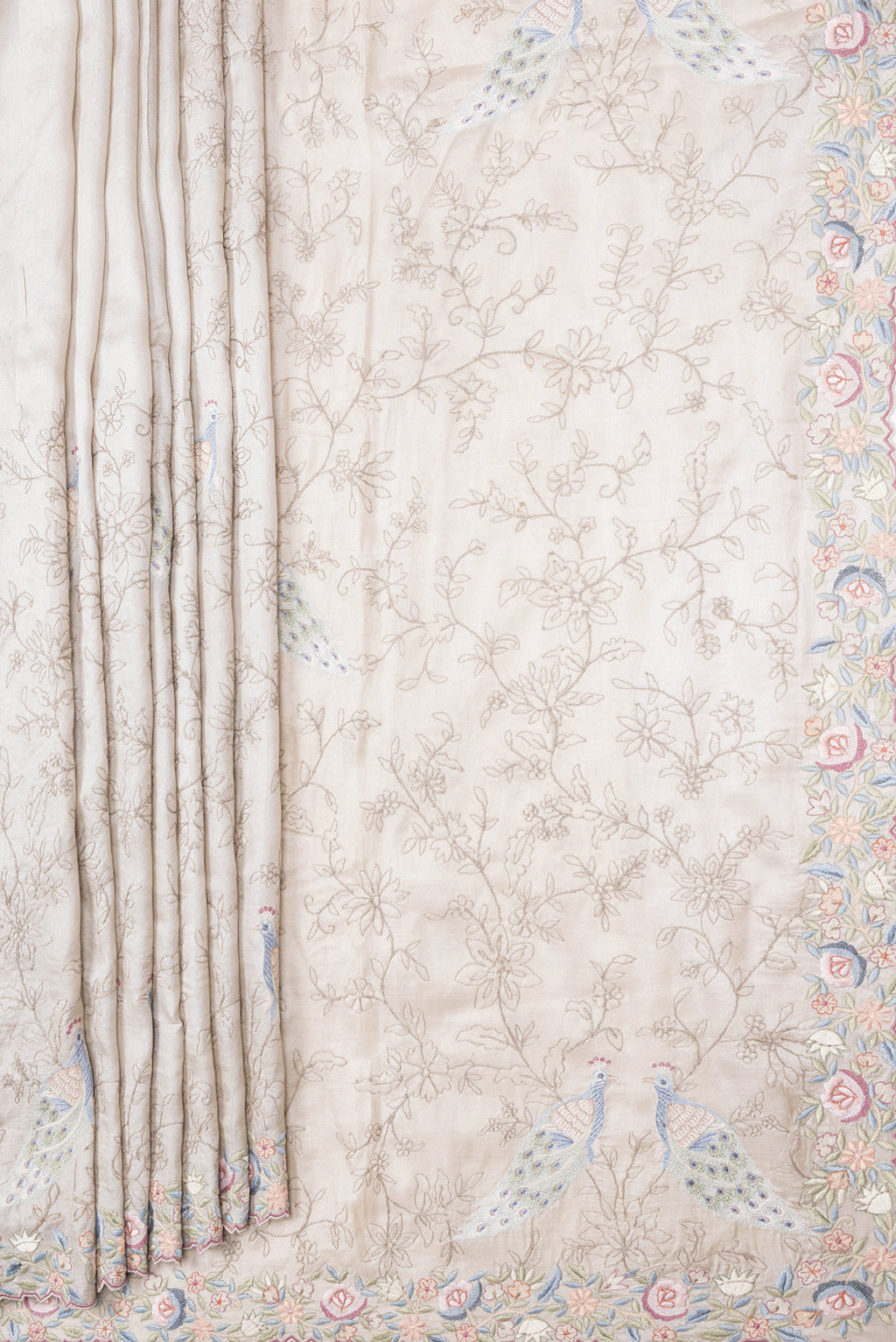 Pleats and pallu of Grey Dual Tone Tussar Silk Saree with Embroidery on the body and Embroidery Border. 