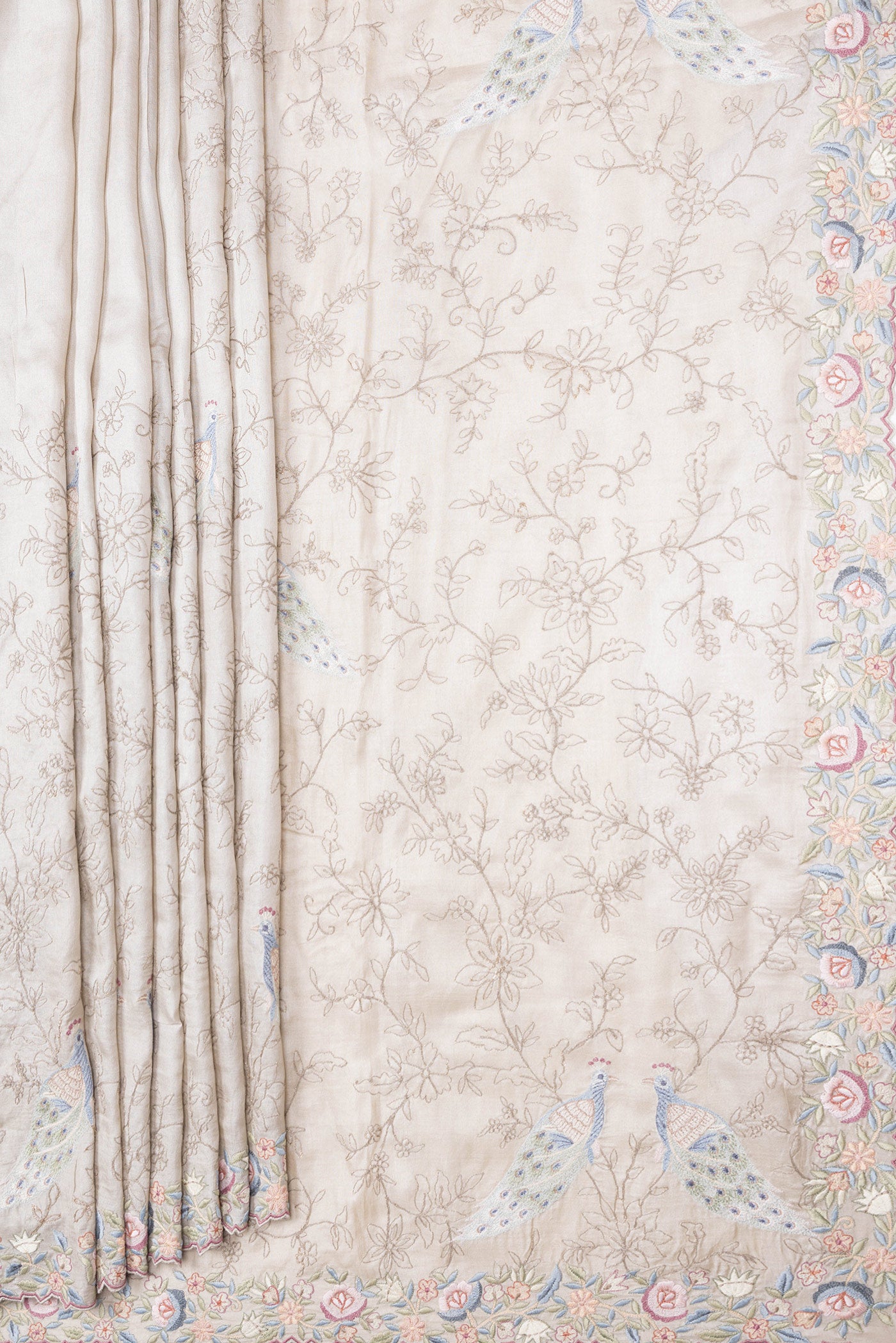 Pleats and pallu of Grey Dual Tone Tussar Silk Saree with Embroidery on the body and Embroidery Border. 