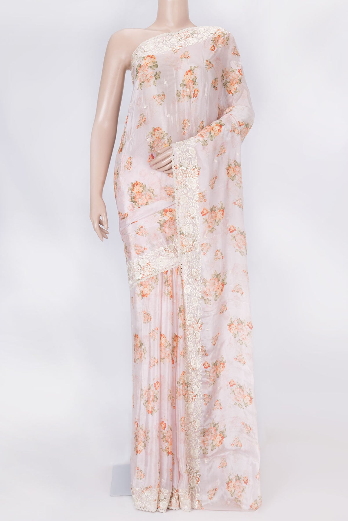Pink Dual Tone Mysore Crepe Saree with Printed design on the body and Embroidery Border displayed on a mannequin