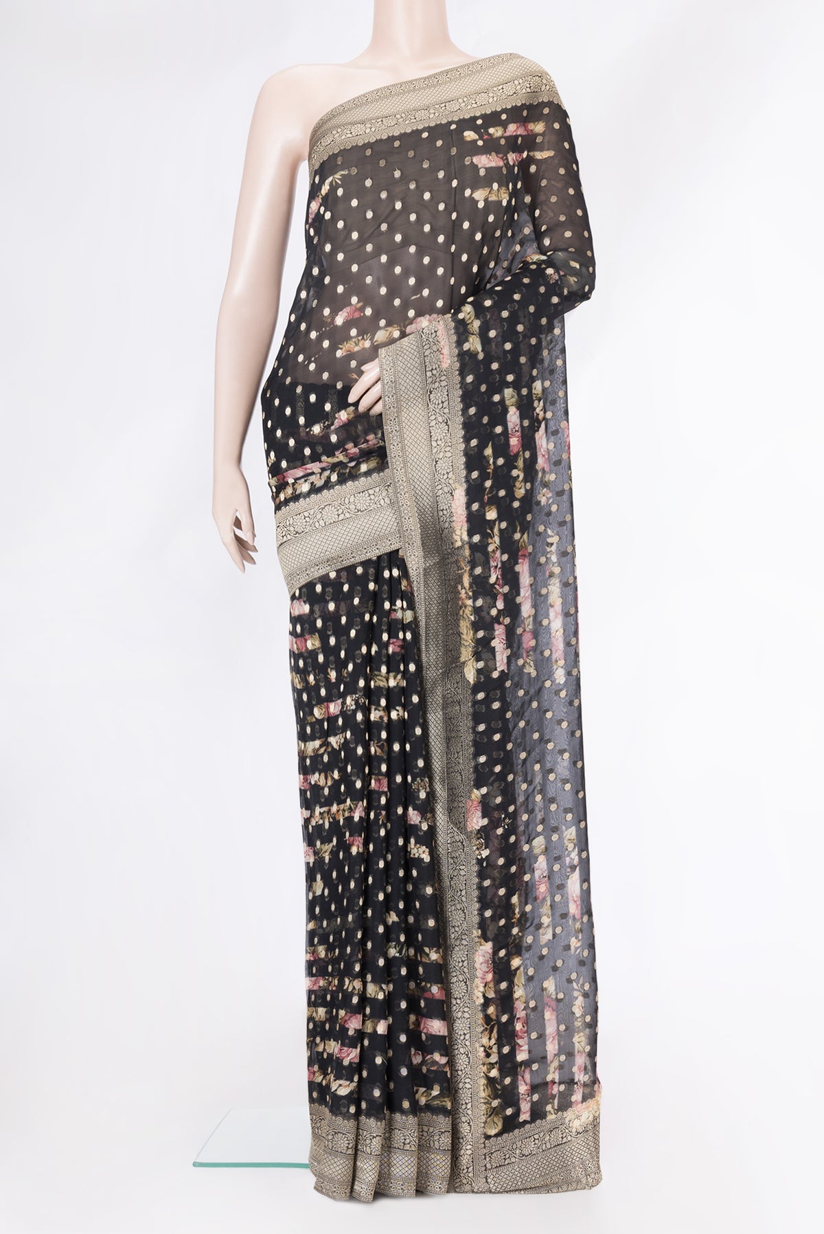 Black Dual Tone Organza Silk Saree with Zari Butta on the body and Zari Border.  displayed on a mannequin